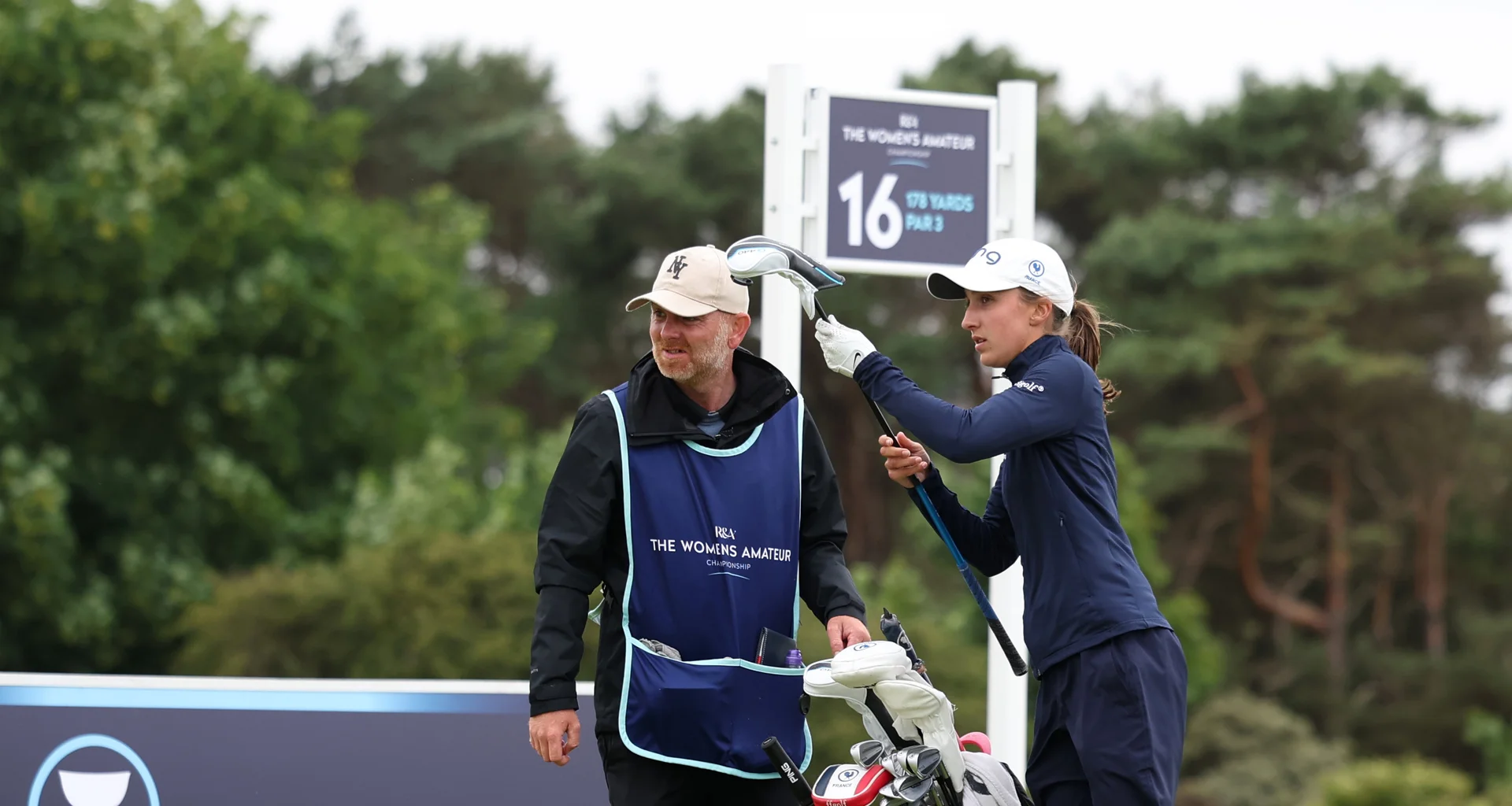Valentine Delon of France looks on with her caddie during the Semi Finals of the 2026 Women's Amateur Championship at Muirfield.