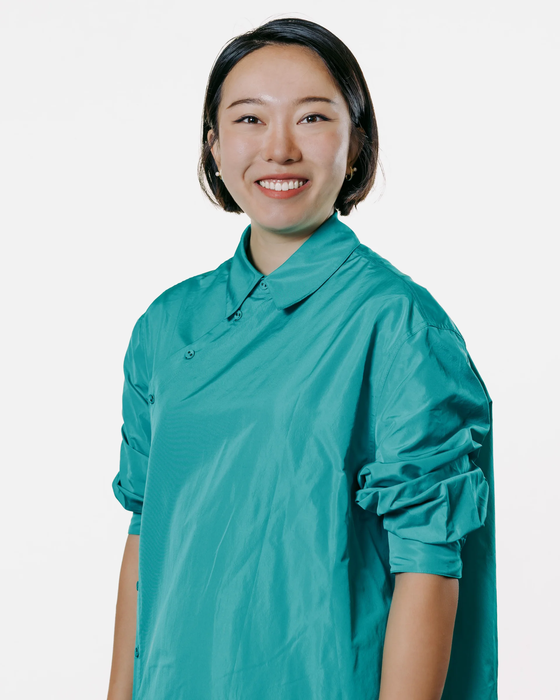A professional portrait image of Tina Tang.