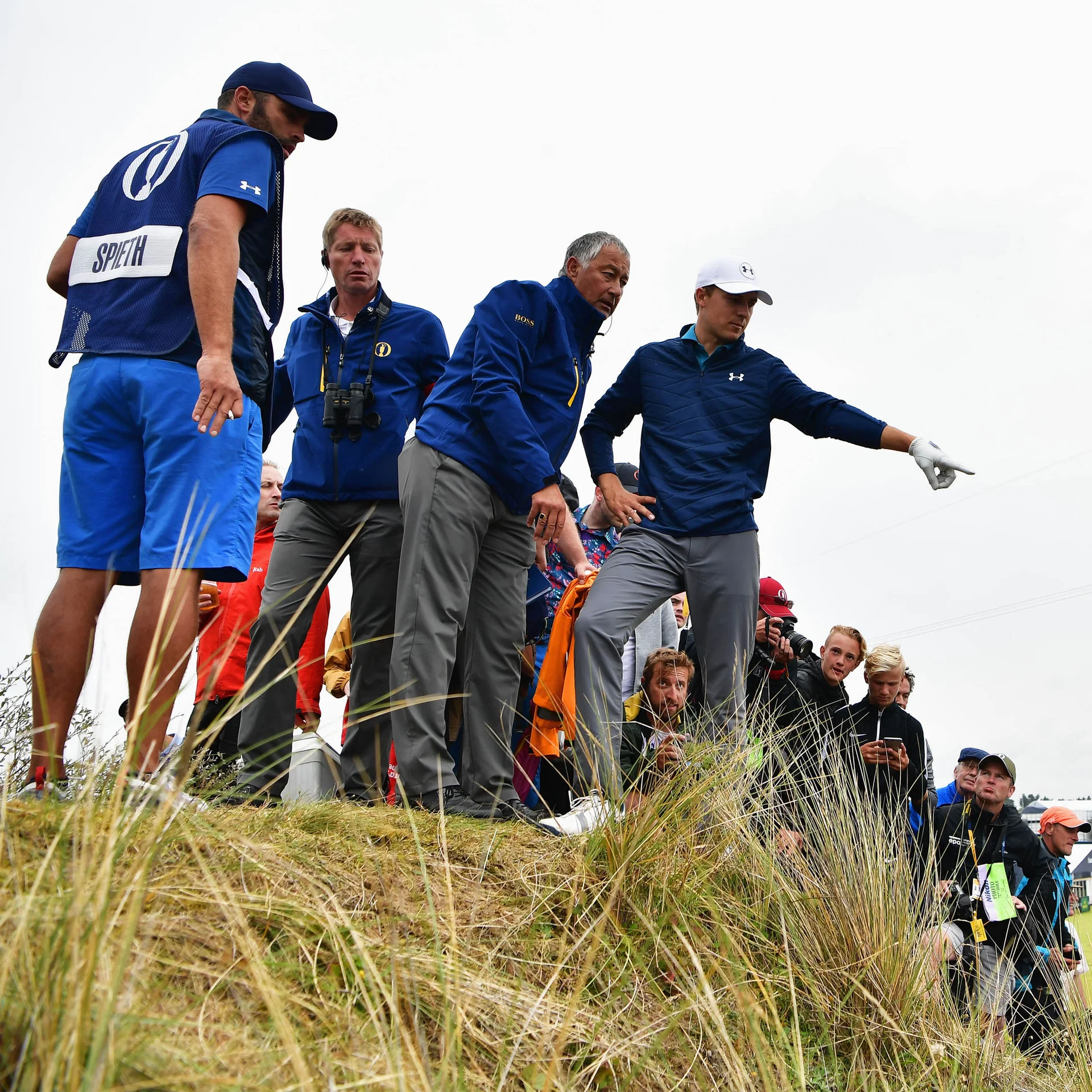 Jordan Spieth of the United States with Rules Officials on the 13th hole during the final round of the 146th Open Championship at Royal Birkdale