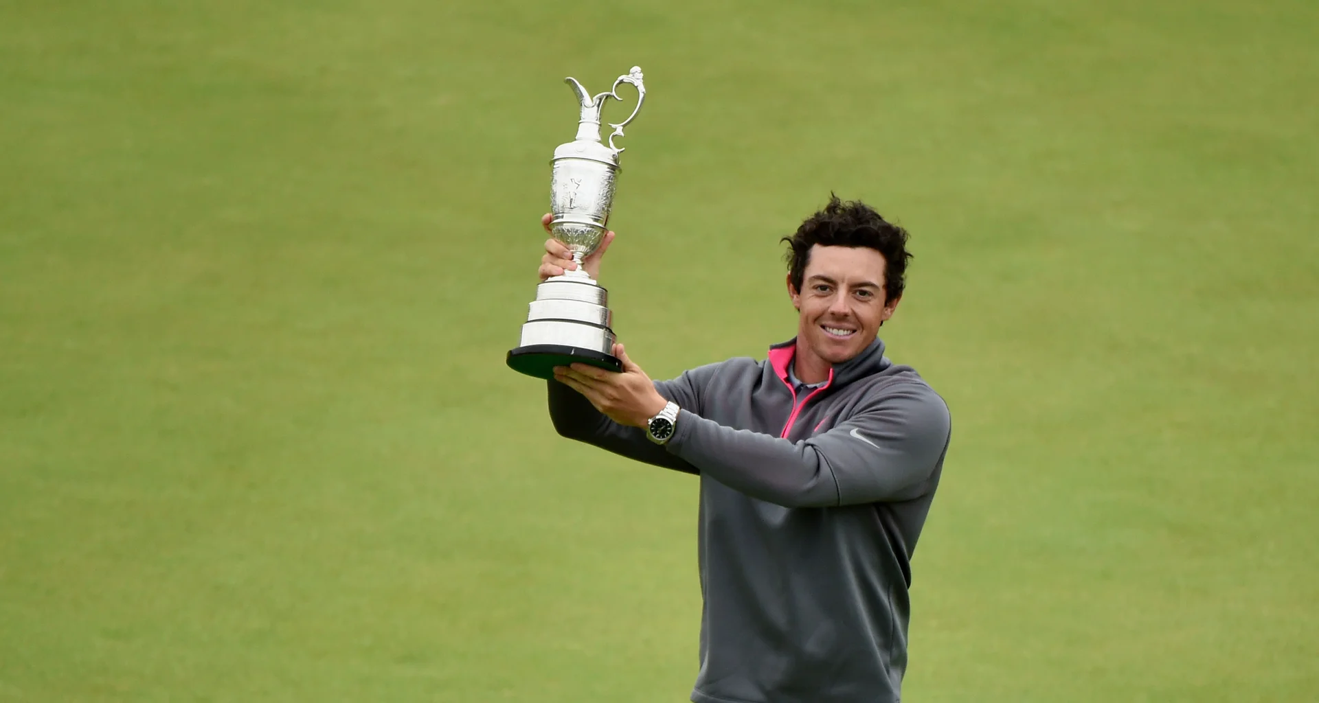 Rory McIlroy celebrates with the Claret Jug after winning The Open at Royal Liverpool.