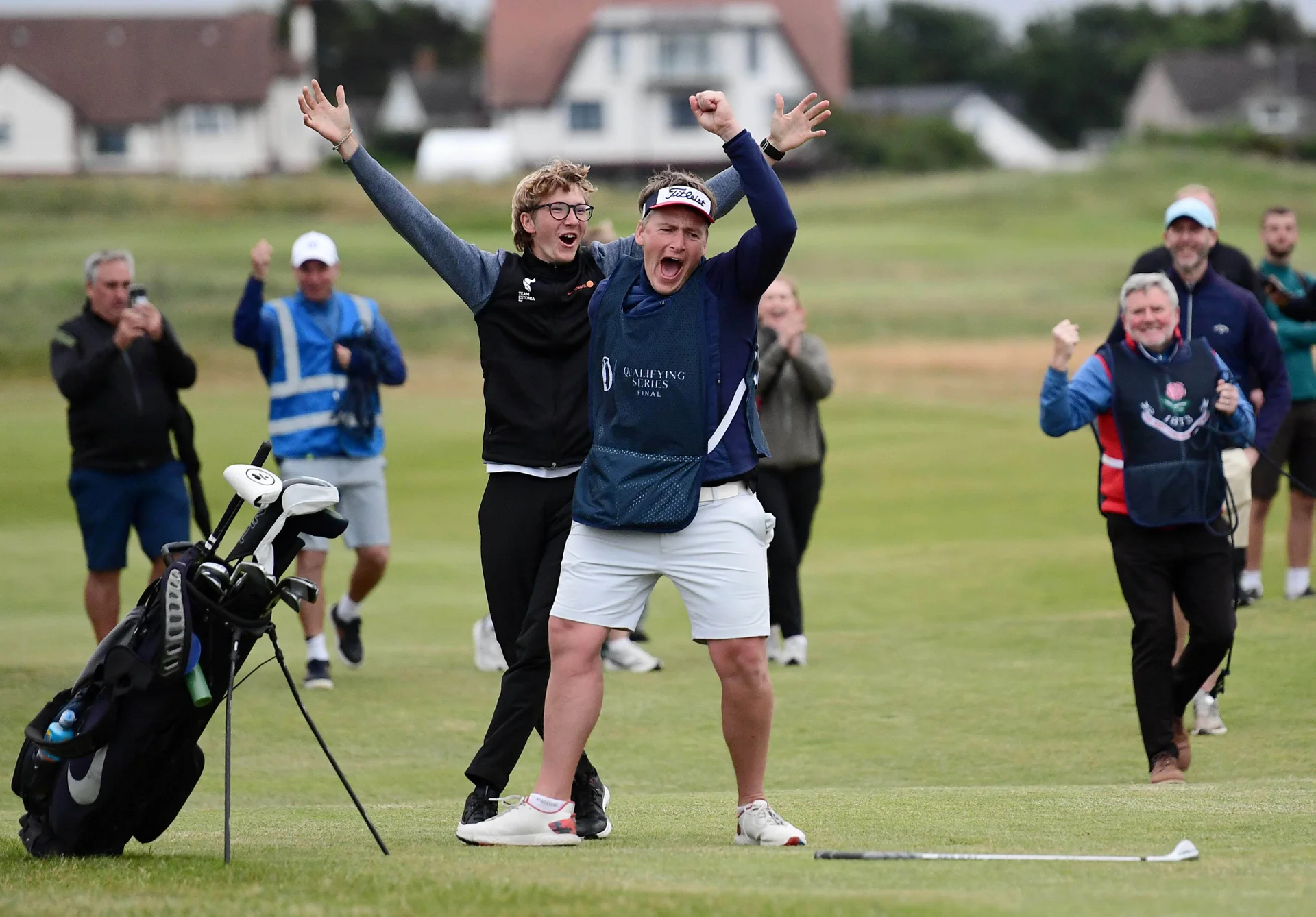 Richard Teder of Estonia celebrates a hole out for eagle with his caddie during the third playoff hole to qualify for The Open Championship during final qualifying at The West Lancashire Golf Club.