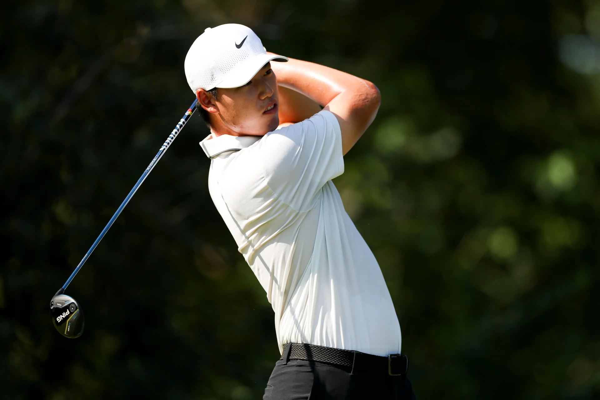 Wenyi Deng of China plays a shot.