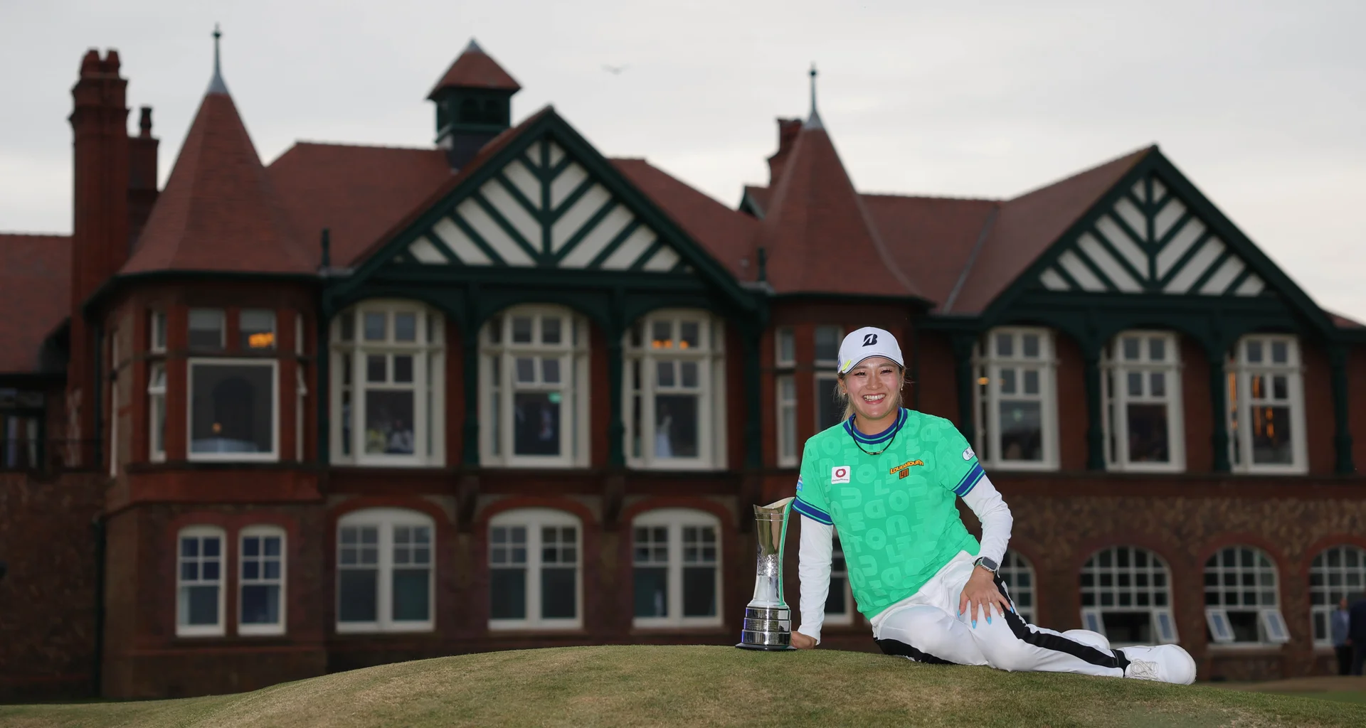 Shiho Kuwaki of Japan poses with the trophy following victory of the AIG Women's Open following the Final Round of the AIG Women's Open 2026 at Royal Lytham & St. Annes.