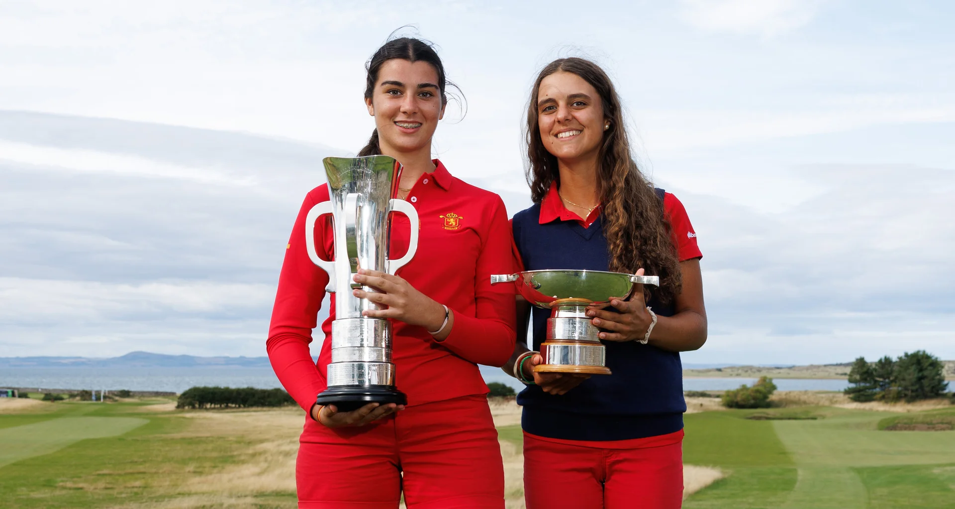 Marta Munoz and Adriana Garcia hold their trophies following the final of the 2026 Girls' Amateur Championship.