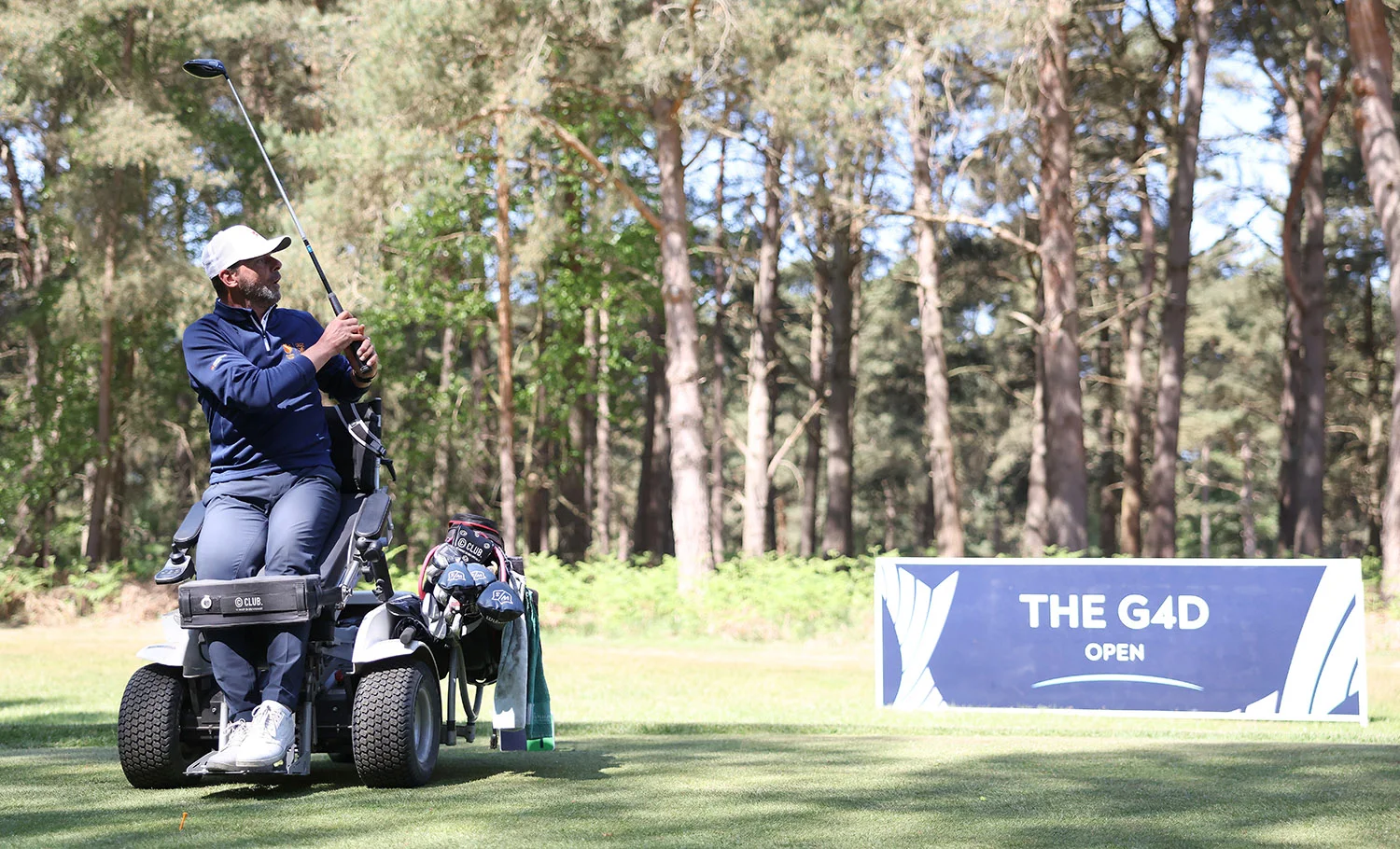 Richard Kluwen plays a tee shot in his Paragolfer at The G4D Open in 2025.
