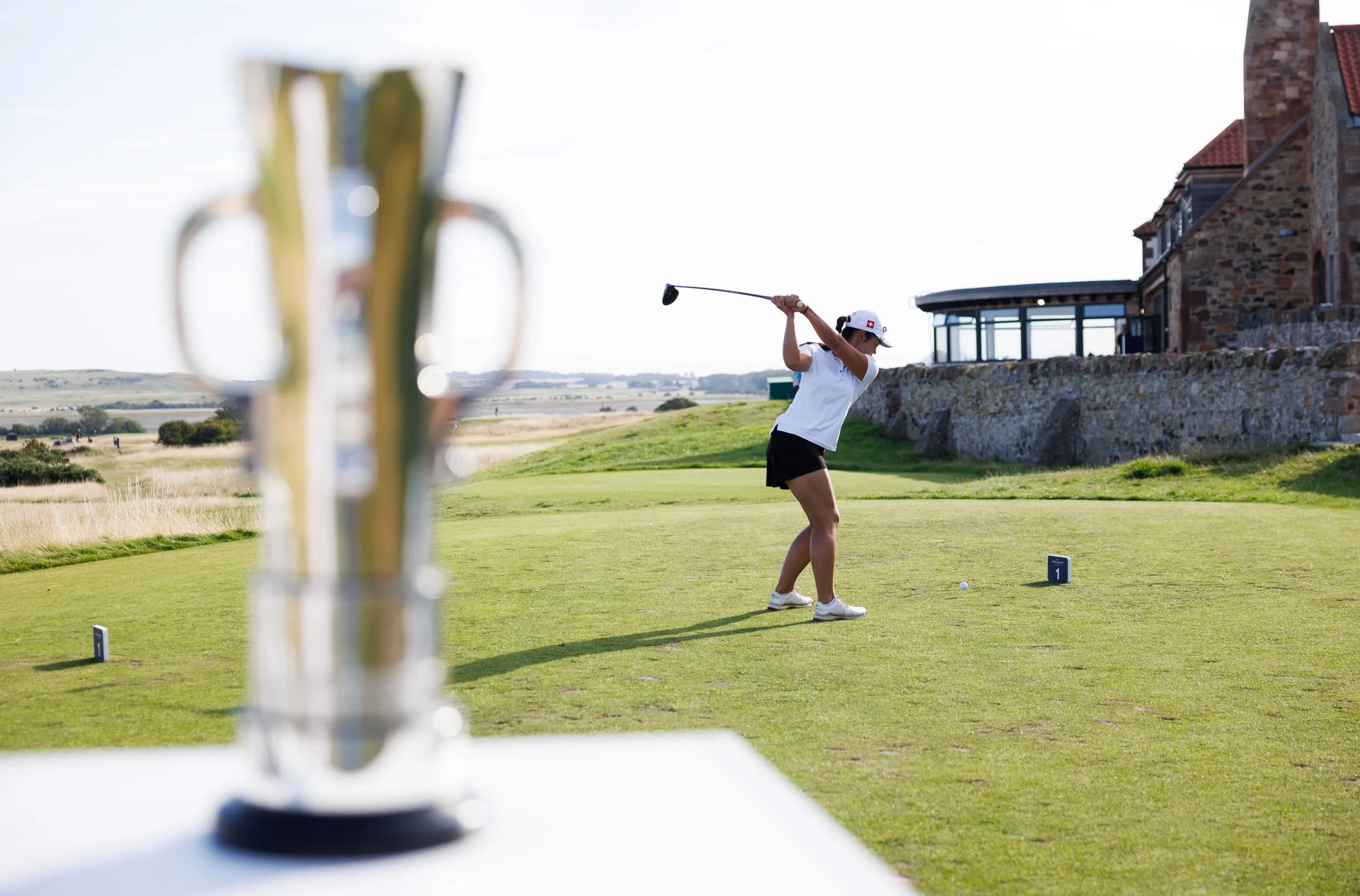 Lana Guyot of Switzerland plays a tee shot at the 1st hole during Day Three of the R&A Girls' Amateur Championship.