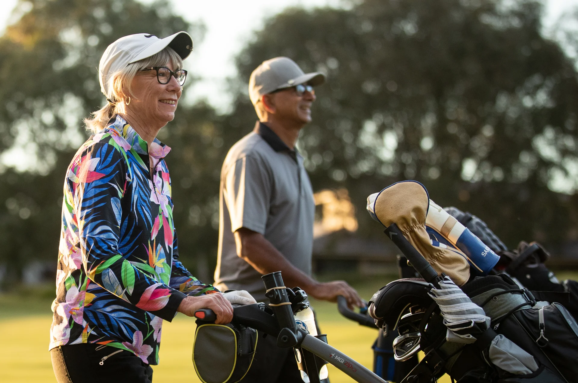Two golfers out on the course