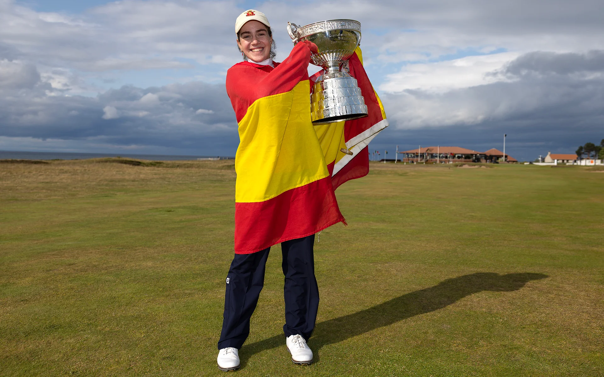 Paula Martin Sampedro lifts the Women's Amateur Championship trophy at Nairn