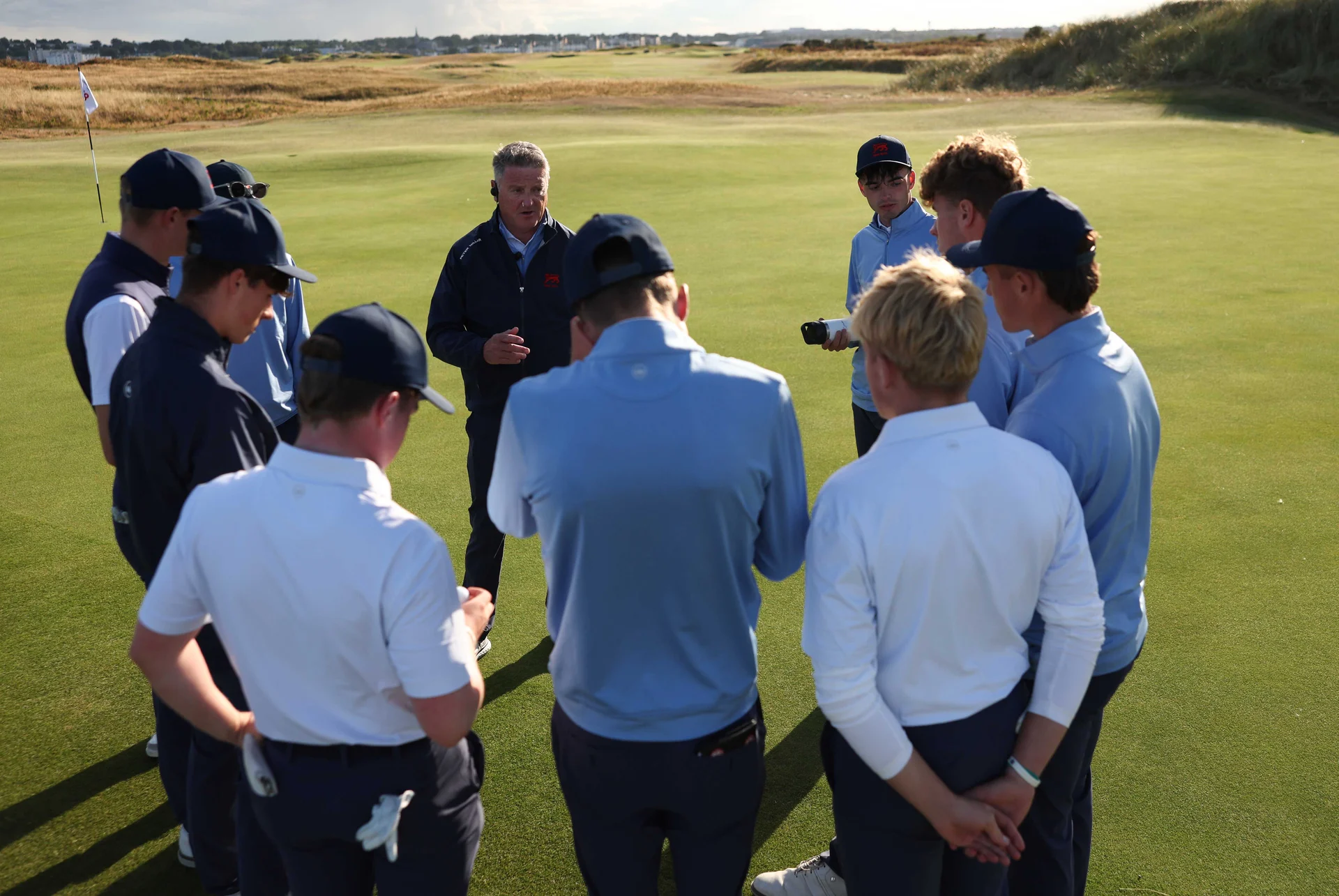 Team Great Britain and Ireland huddle for a team talk after day one of the Jacques Leglise Trophy.