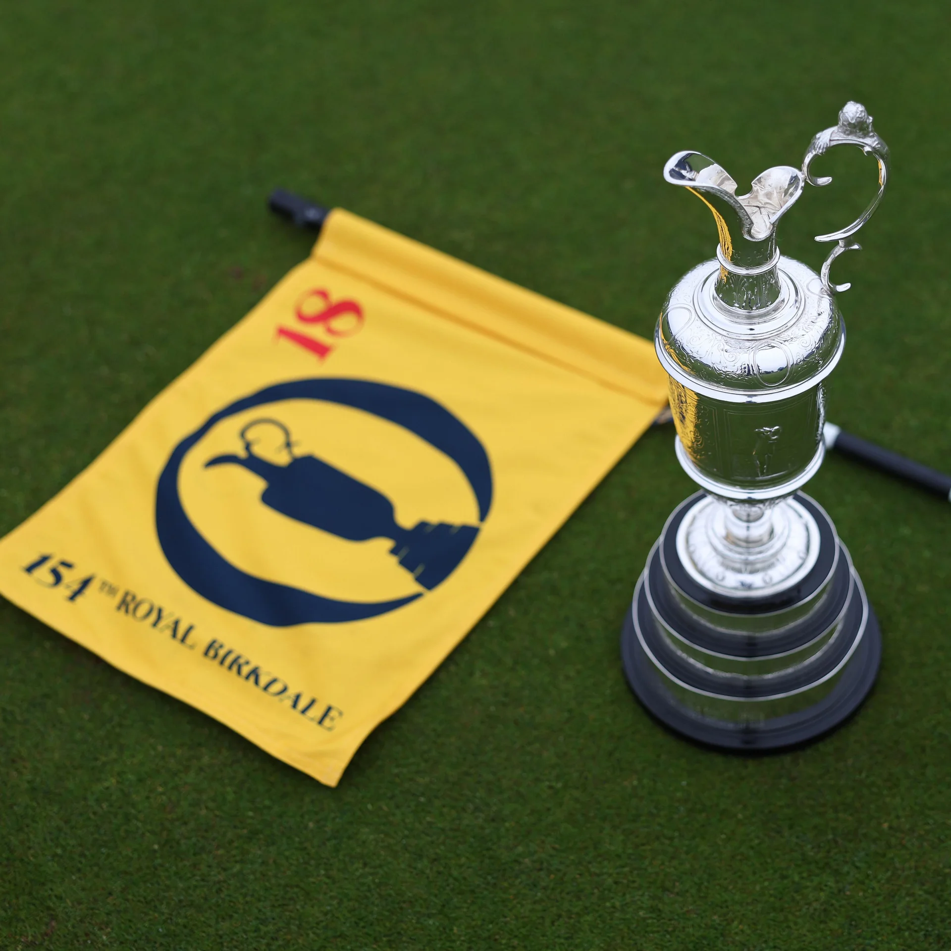 A view of the Claret Jug and The Open pin flag on the 18th green at Royal Birkdale.