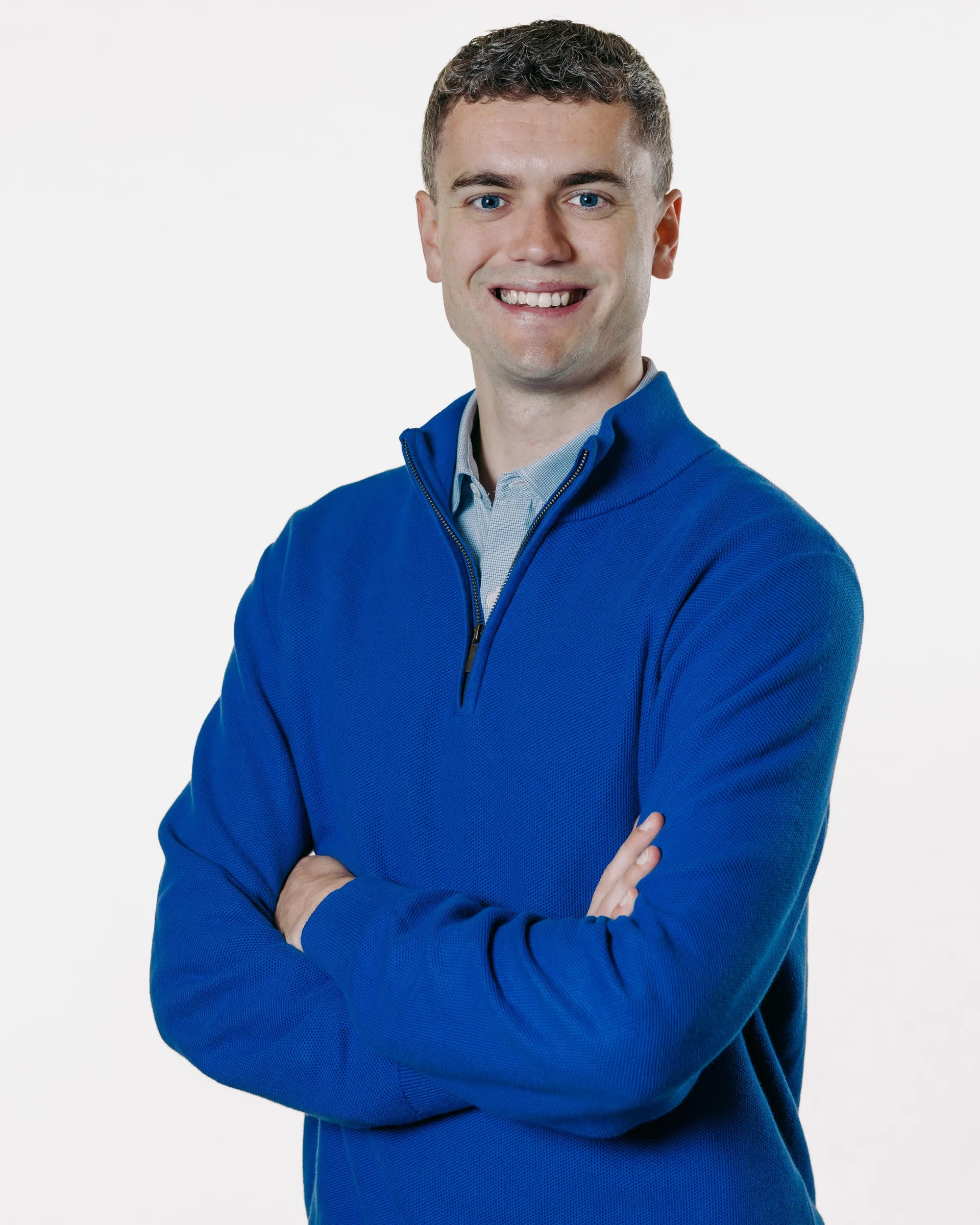 A professional portrait image of Ronan Murray.