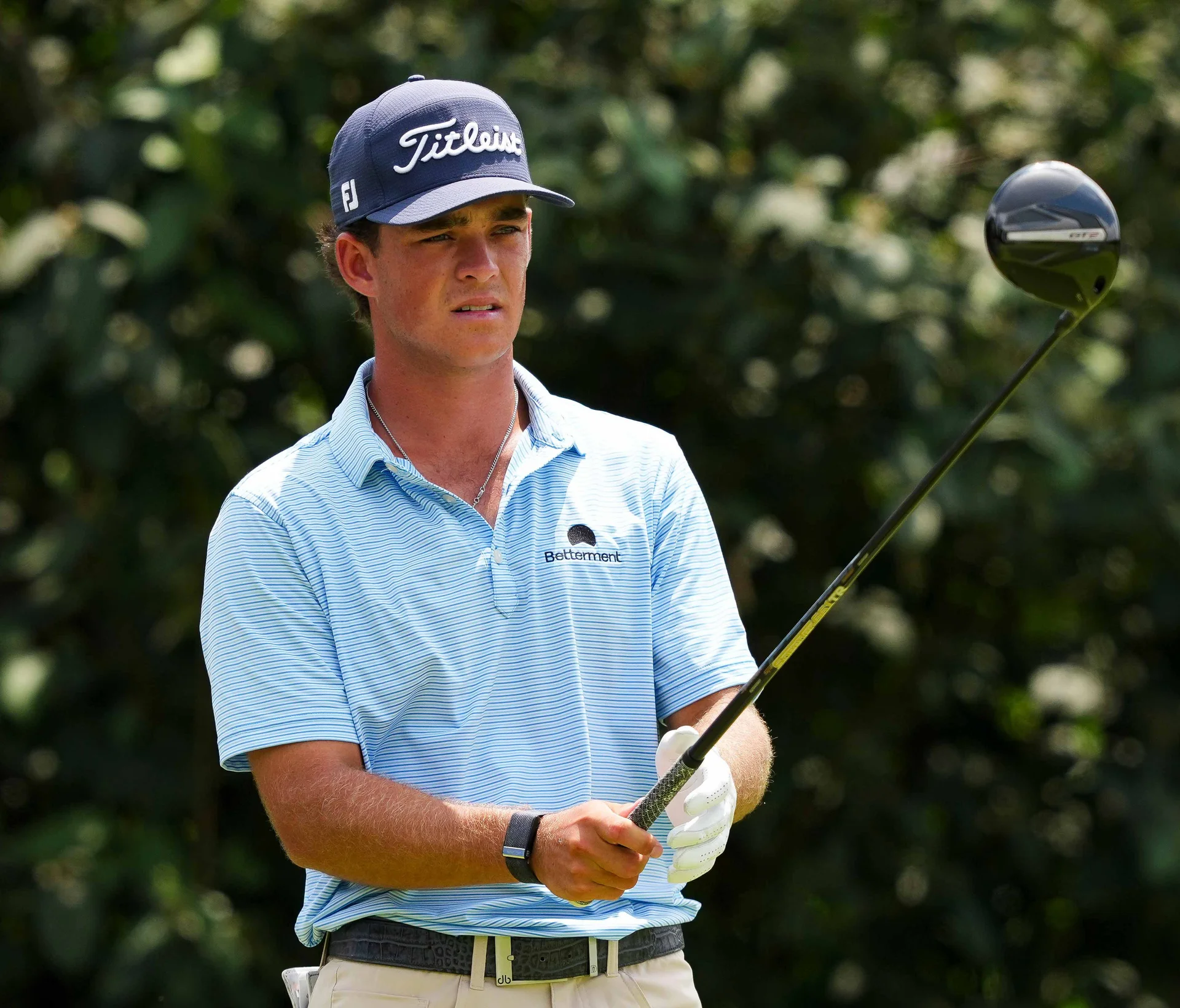 Jackson Koivun prepares to play a golf shot.