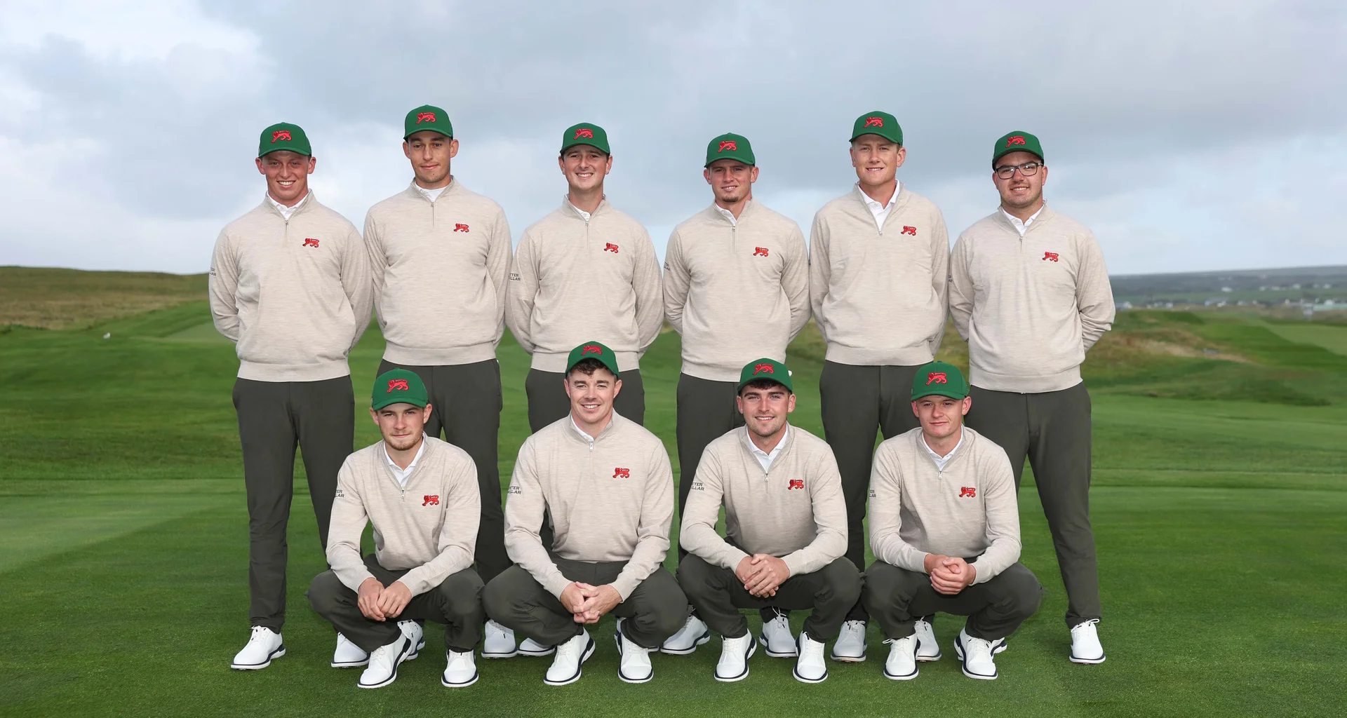 The GB&I Walker Cup squad stand together posing for a team photograph on the first tee at Lahinch.