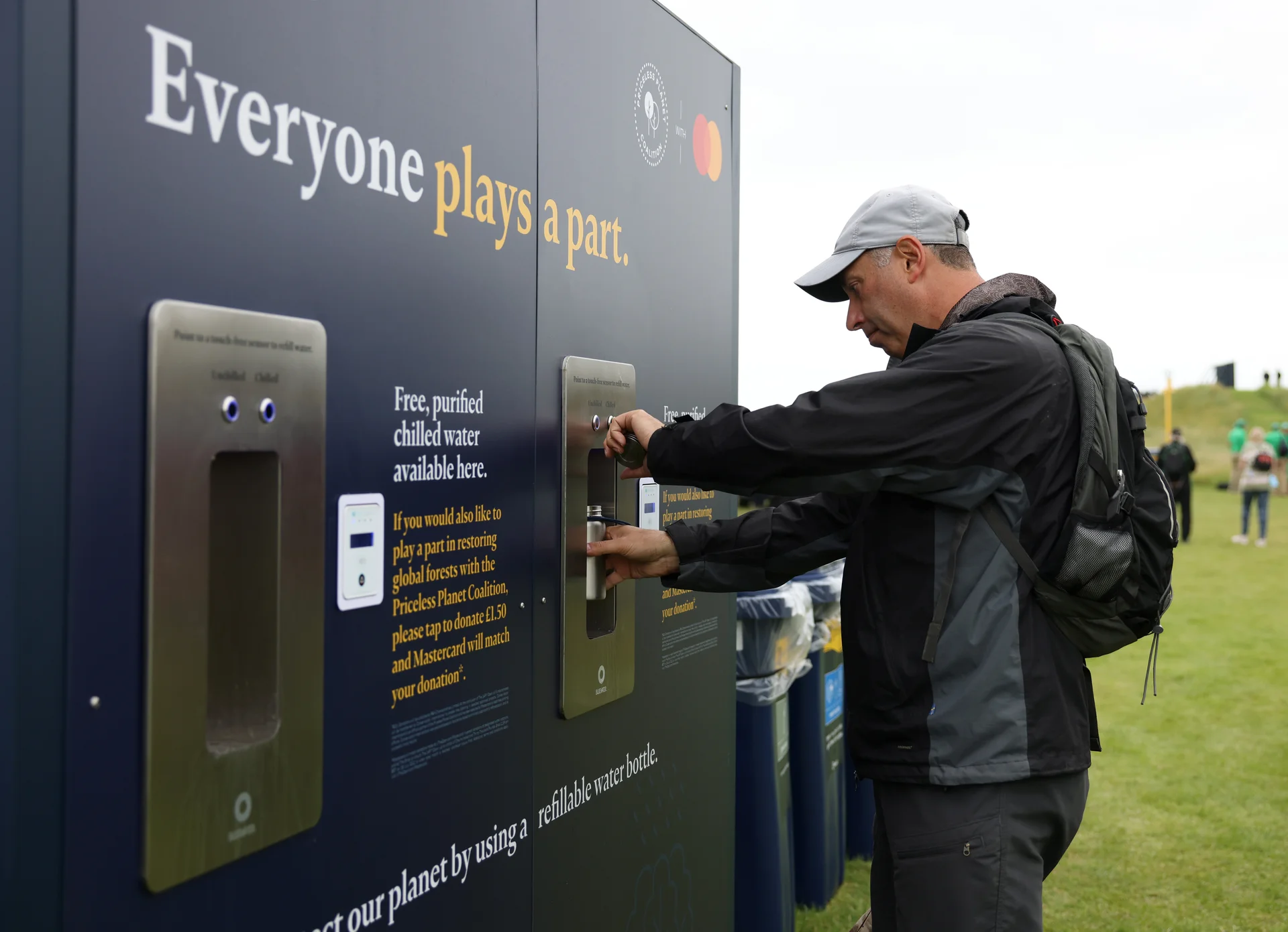 Man fills water bottle