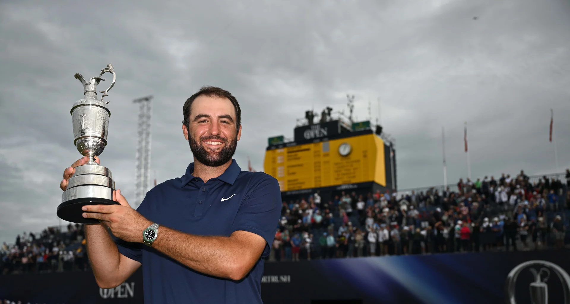 Scottie Scheffler celebrates with the Claret Jug at The 153rd Open at Royal Portrush.
