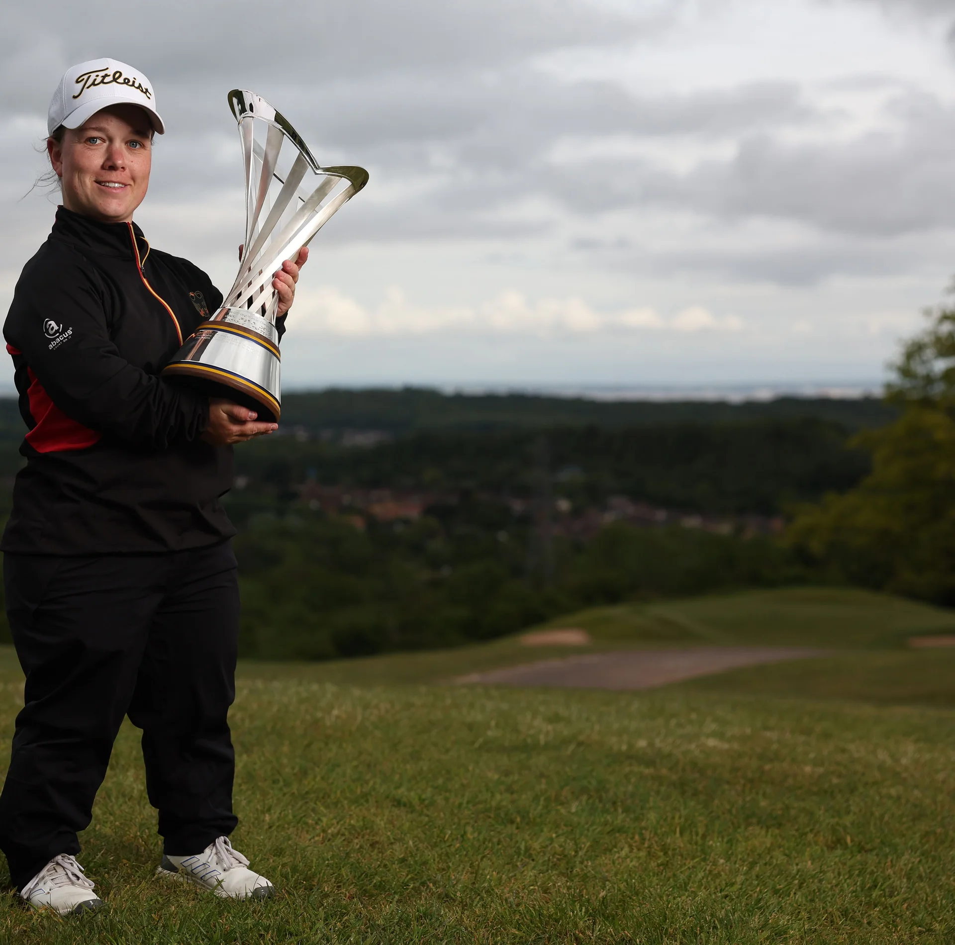 Jennifer Sraga celebrates with the G4D Open trophy at Celtic Manor.