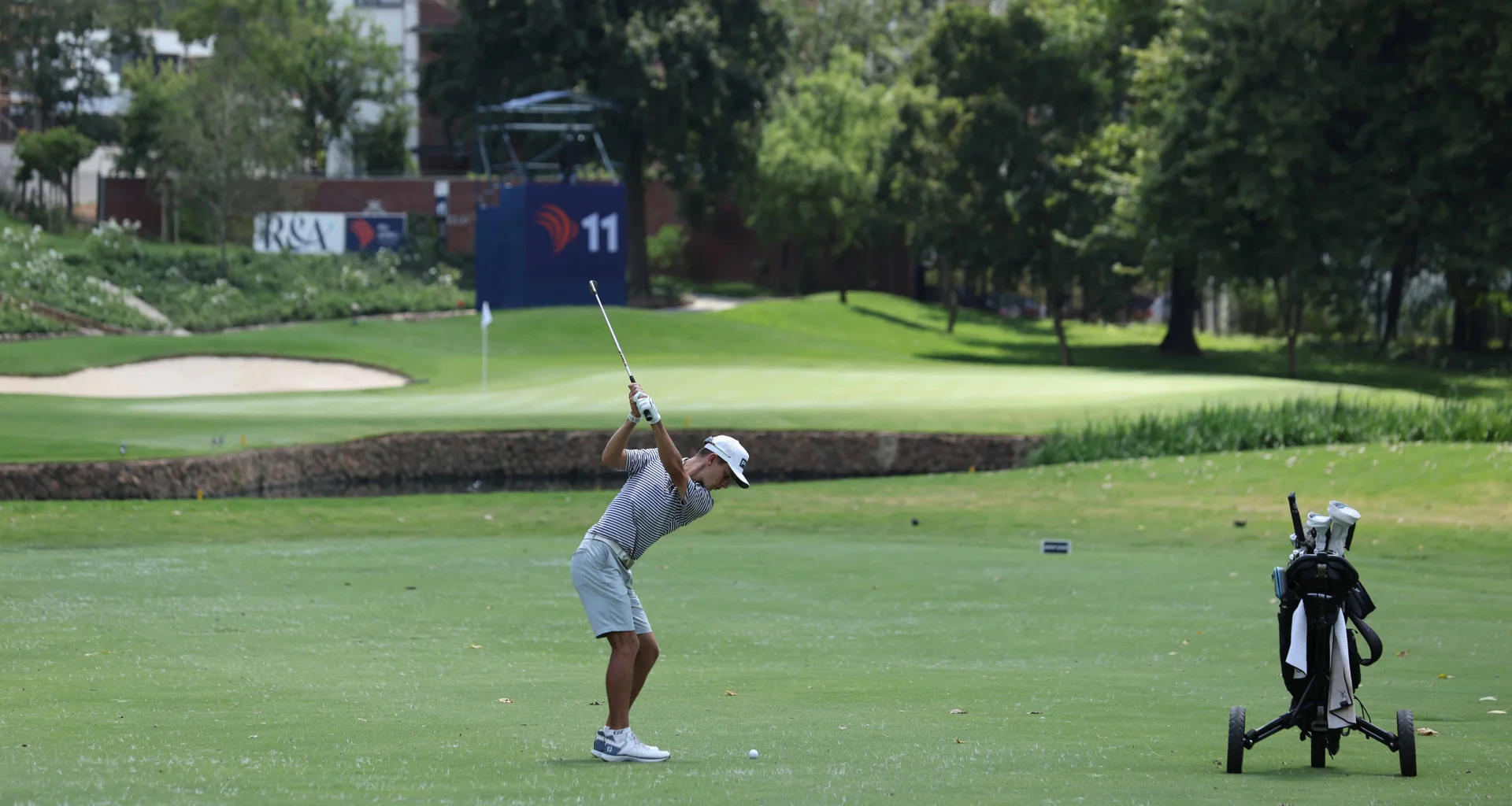 Ivan Verster plays an approach shot during the first round of the Africa Amateur Championship at Royal Johannesburg.