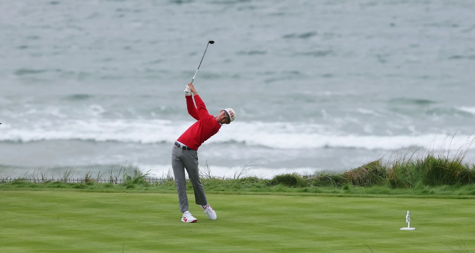 Miles Russell of Team USA tees off on the fourth hole during the foursomes matches on day two of the Walker Cup at Lahinch.