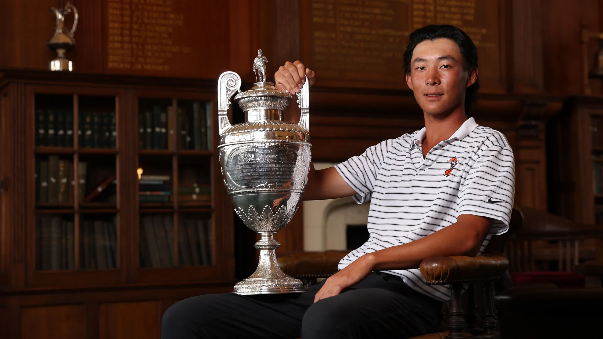 Ethan Fang with The Amateur Championship trophy.