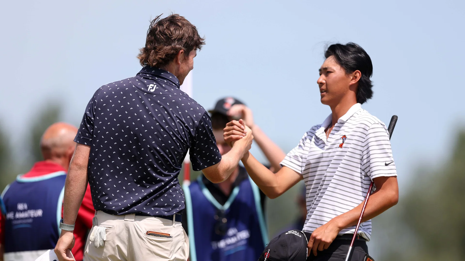 Gavin Tiernan and Ethan Fang shake hands after the first 18 holes of The 130th Amateur Championship final.