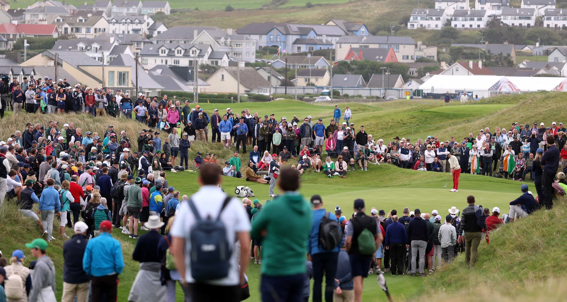 Ethan Fang of the United States putts on the 14th green during the morning foursomes matches on day one of the Walker Cup at Lahinch.