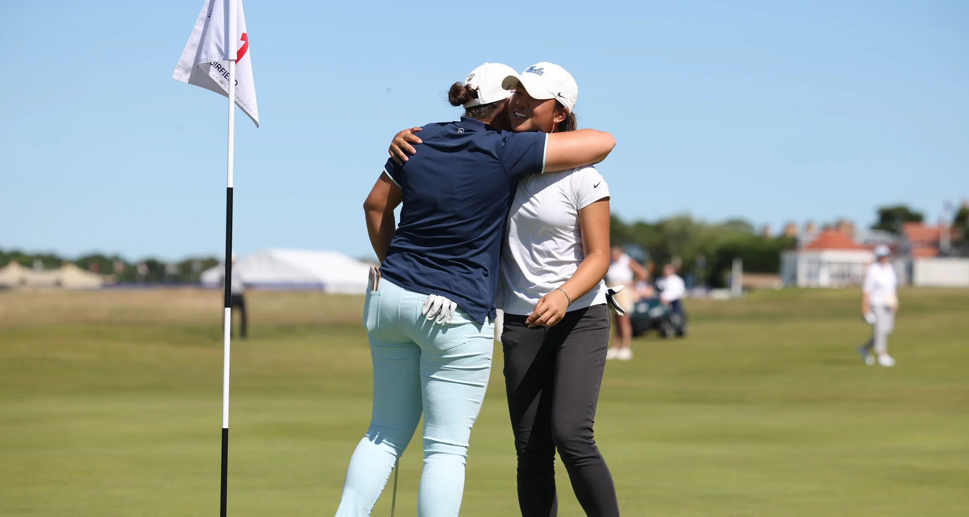 Farah O'Keefe of USA hugs Kacey Ly of the United States after her victory during Day Three of the 2026 Women's Amateur Championship at Muirfield.