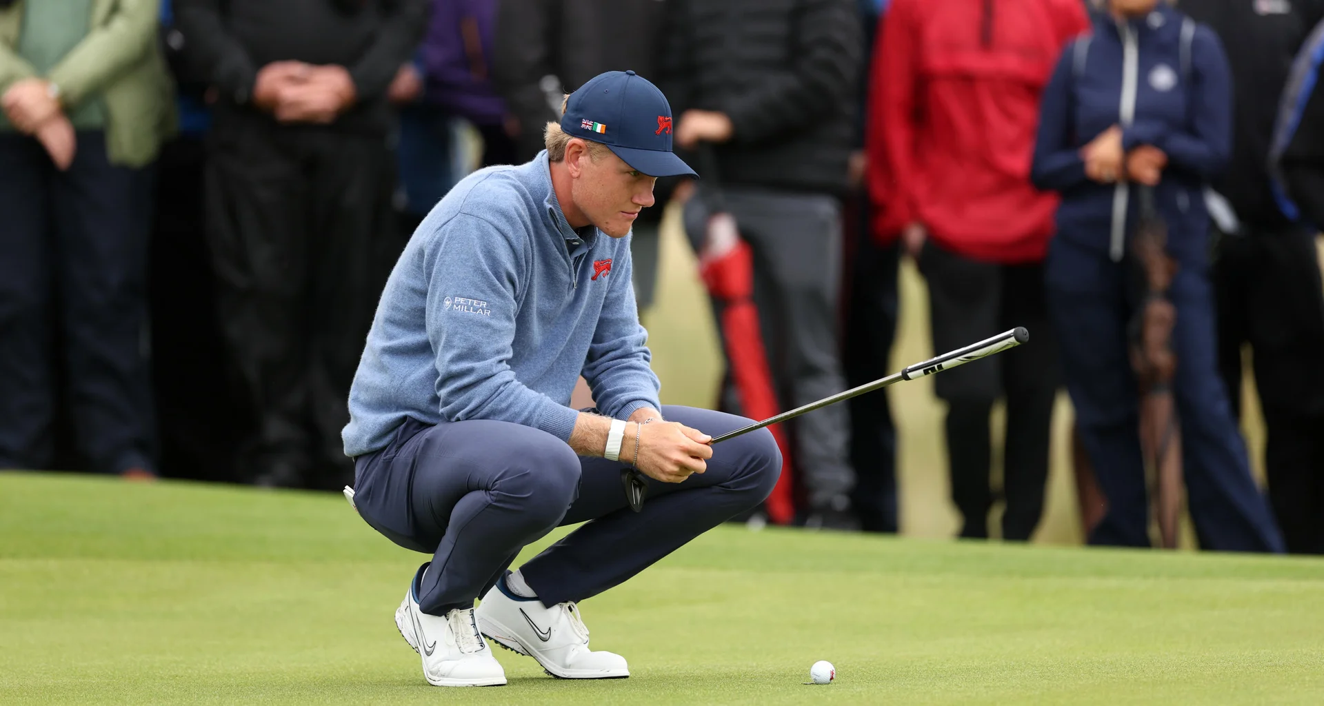 Luke Poulter of Great Britain & Ireland lines up a putt during the Sunday Foursomes on Day Two of the Walker Cup at Lahinch.