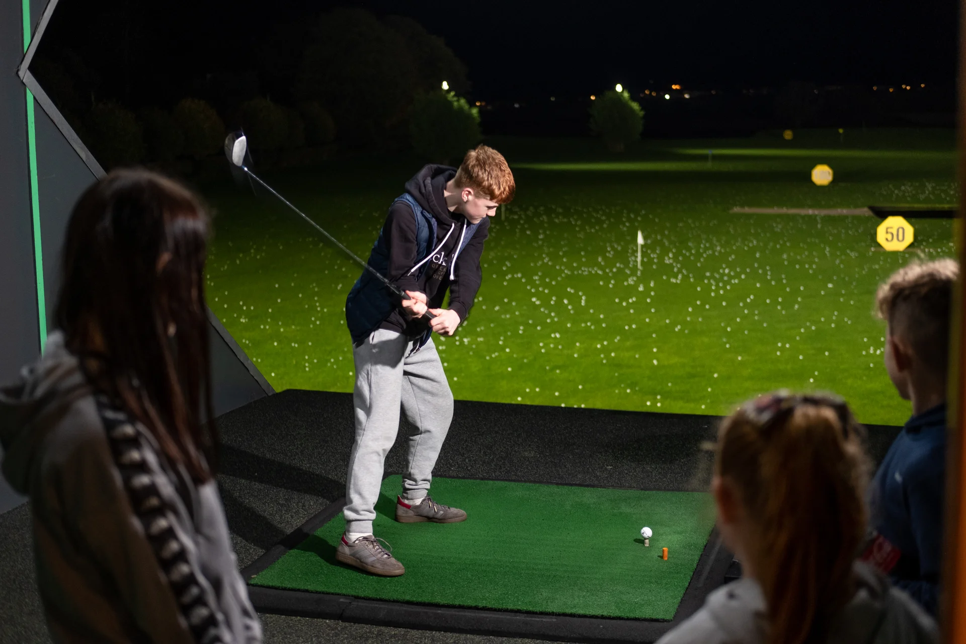Man on driving range