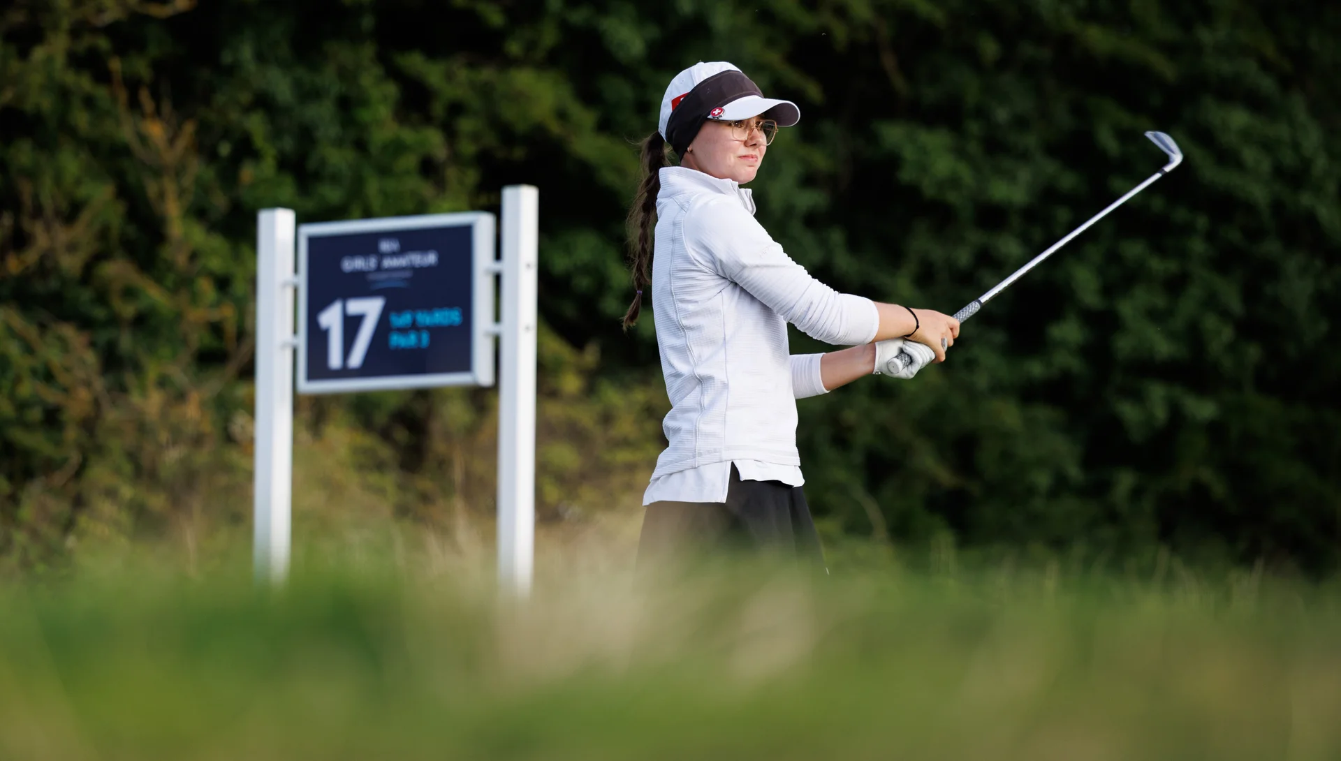 Axelle Martin of Switzerland plays a tee shot at the 17th hole during Day Two of the R&A Girls' Amateur Championship.