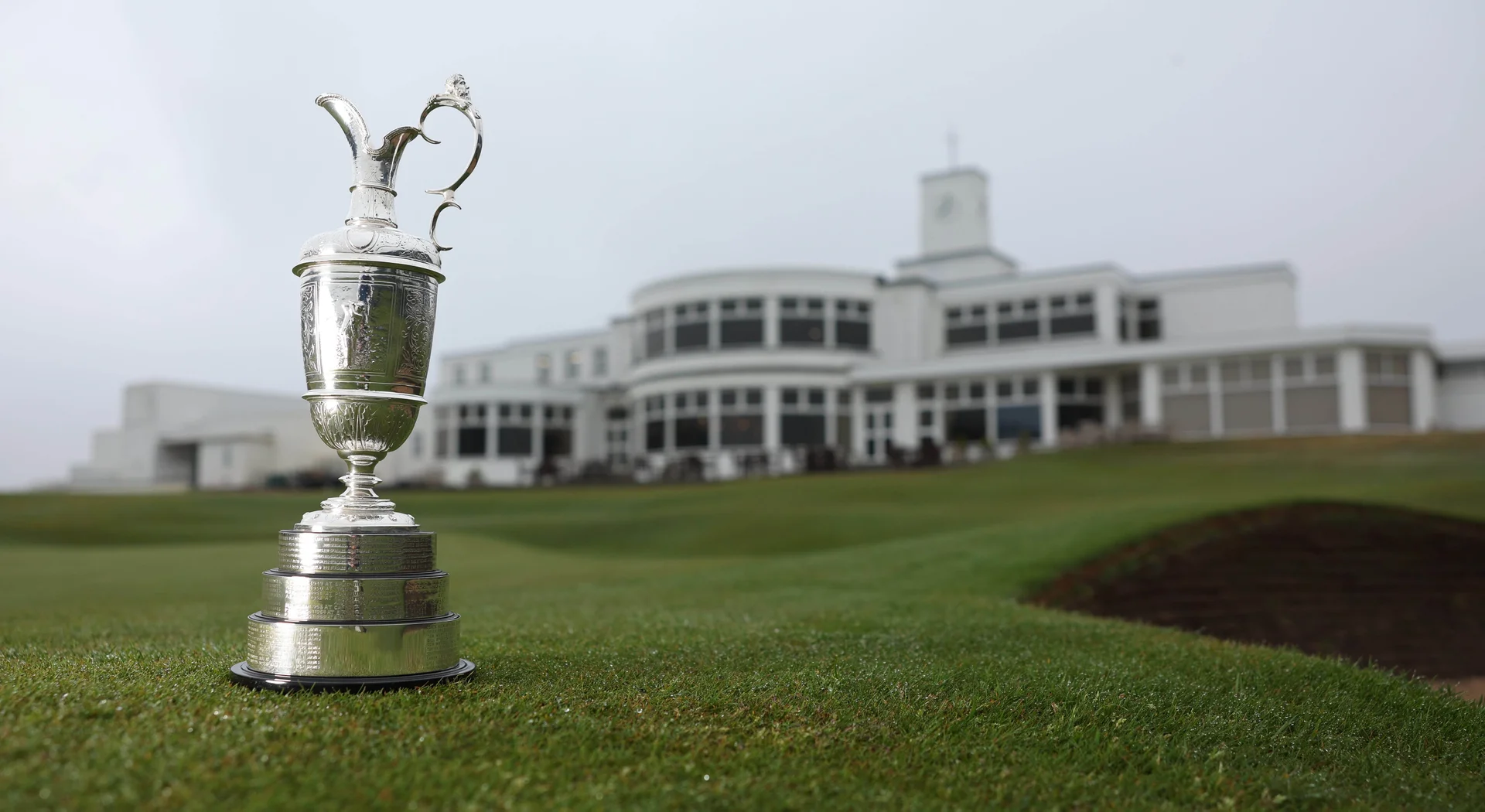 The Claret Jug sitting on the 18th green outside the clubhouse at Royal Birkdale.