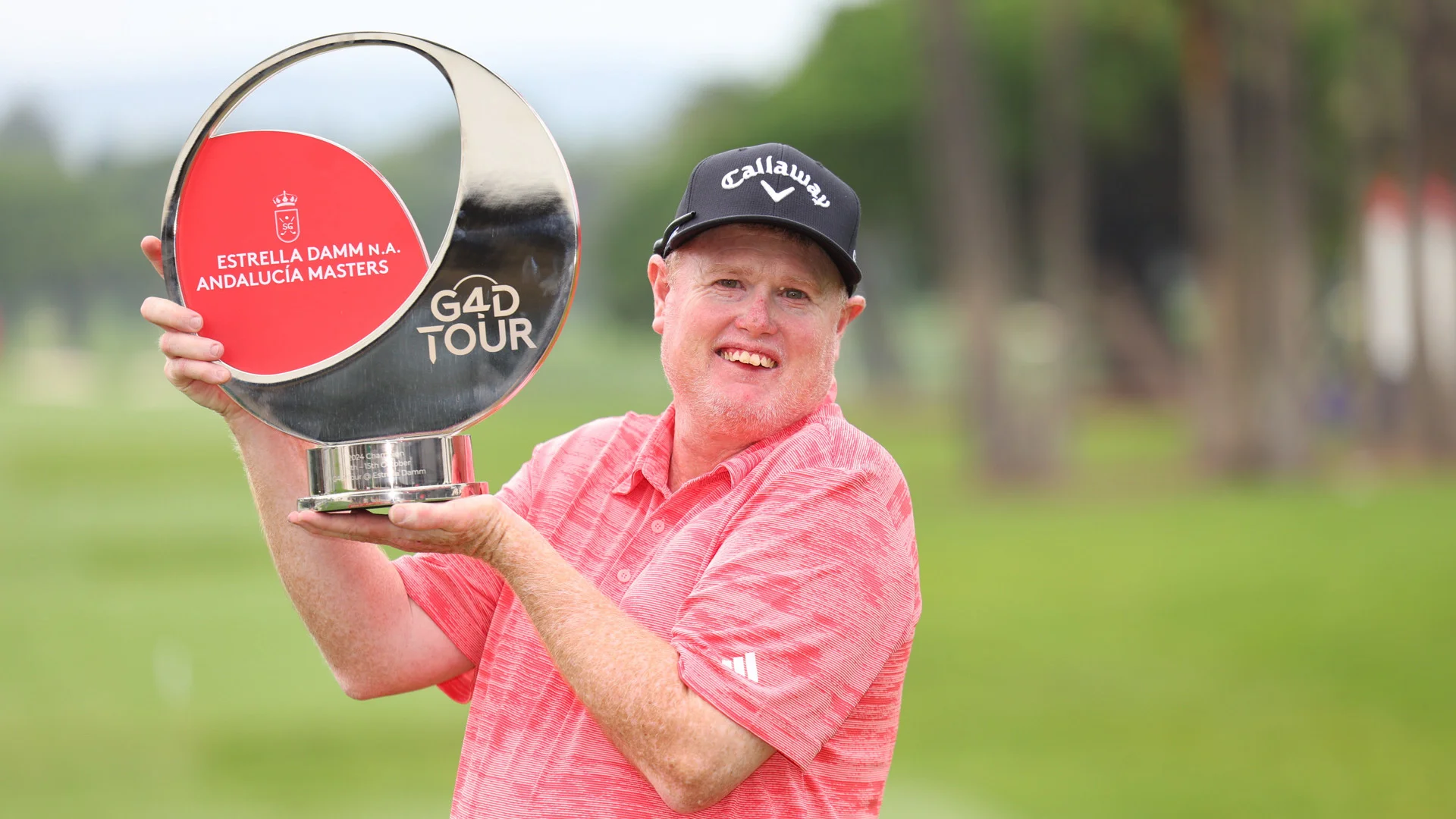 Steven Alderson celebrates his win on The G4D Tour at the Estrella Damm N.A. Andalucía Masters.