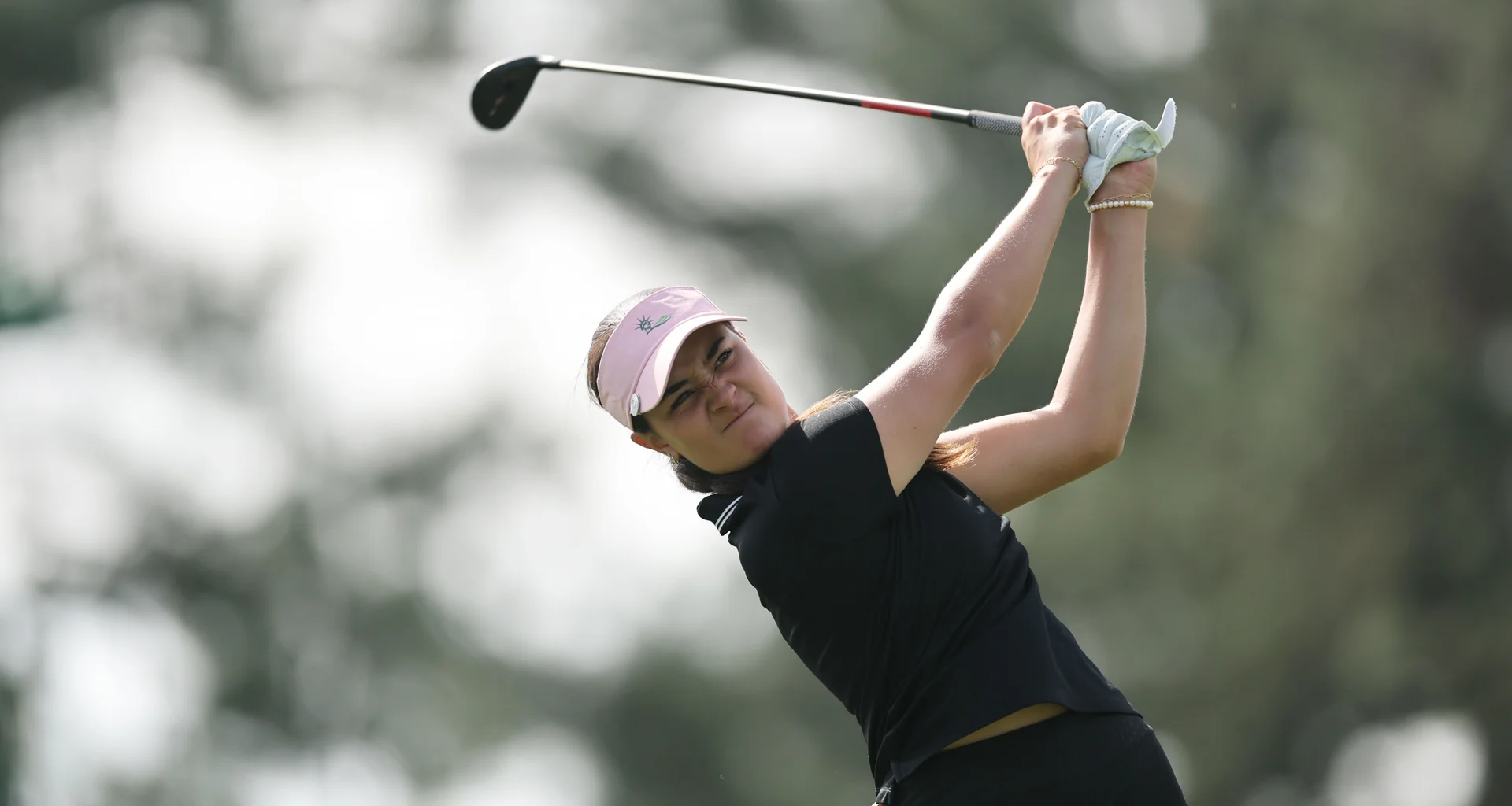 Kiara Romero playing golf.