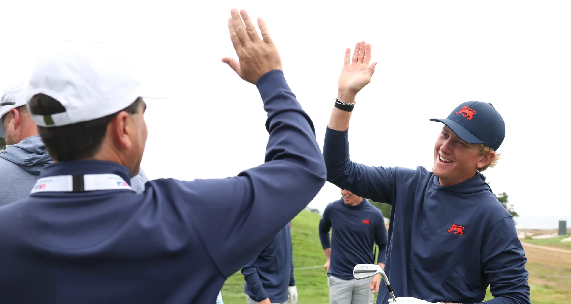 Luke Poulter celebrates a hole-in-one during practice ahead of the Walker Cup at Cypress Point, USA.