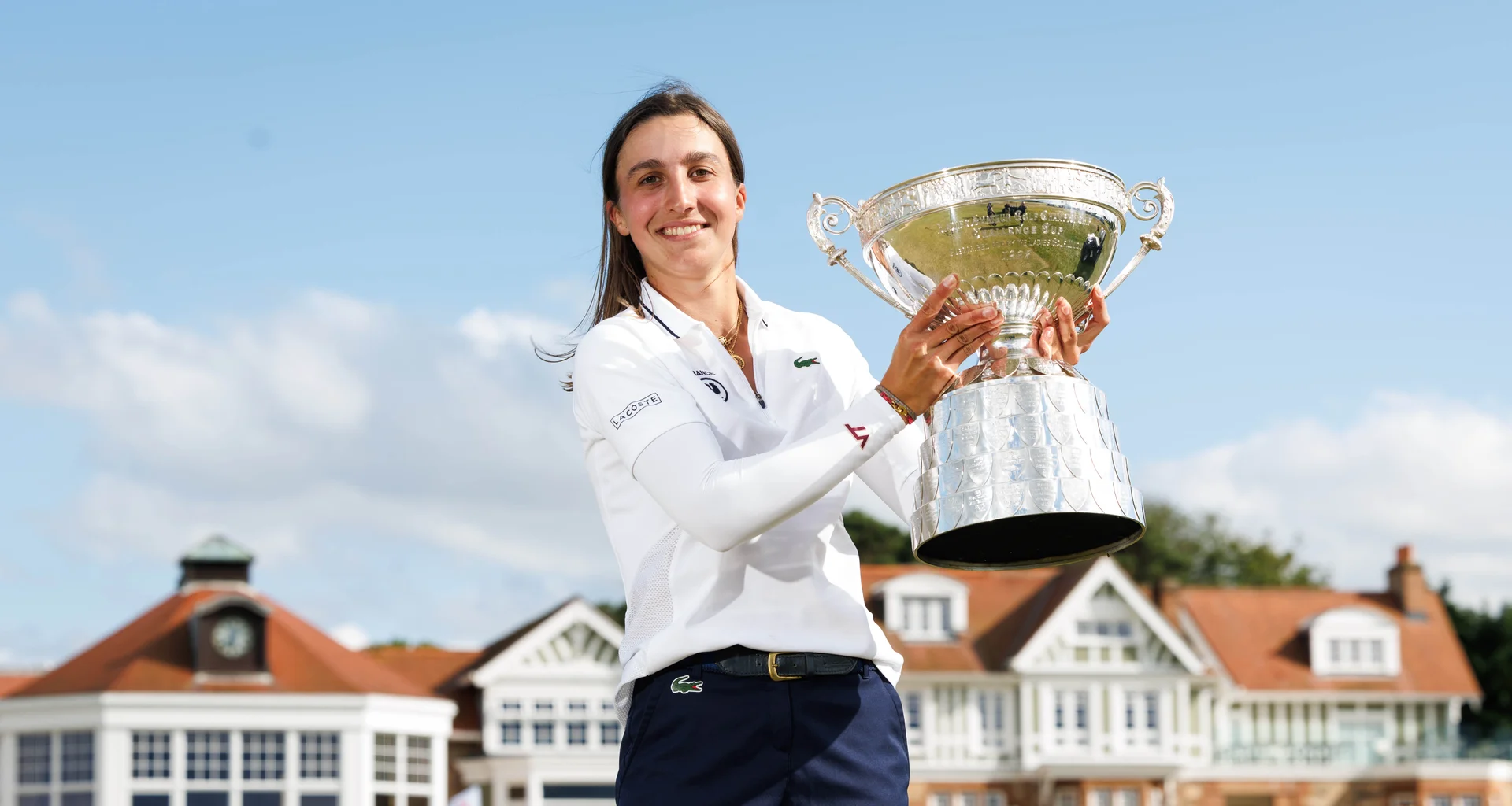 Valentine Delon of France poses with the trophy following her victory during the Final of the 2026 Women's Amateur Championship at Muirfield.