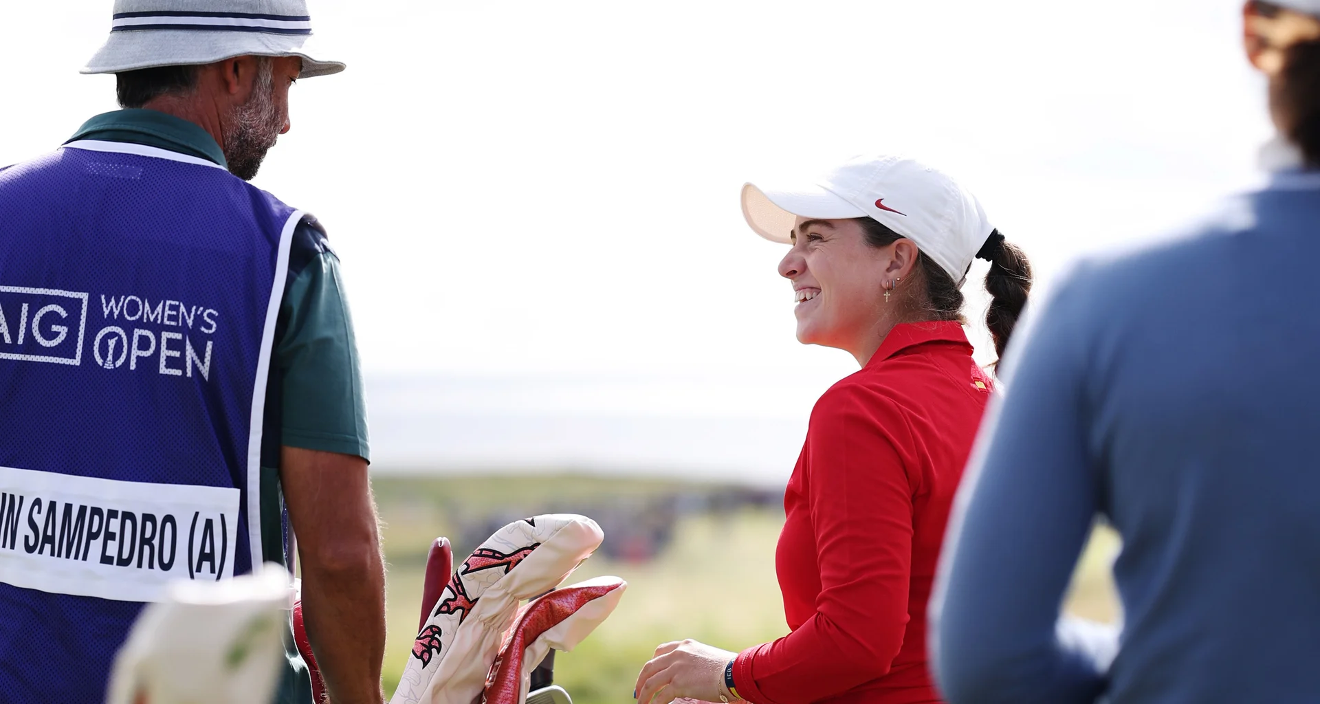 Amateur, Paula Martin Sampedro of Spain smiles with her caddie during the second round of the AIG Women's Open 2025 at Royal Porthcawl Golf Club on August 01, 2025
