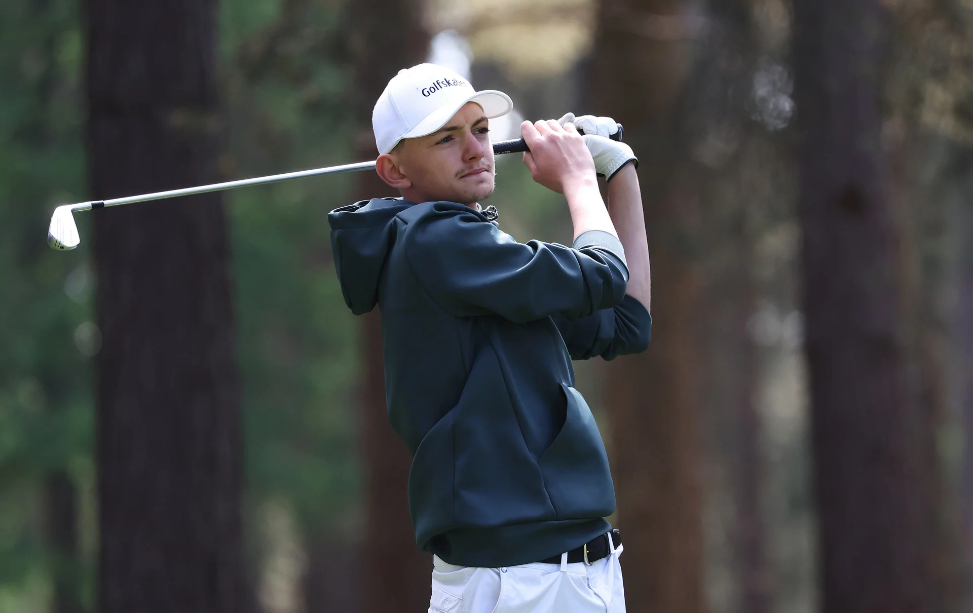 Frederik Brokfelt-Christiansen watches on after okaying an approach shot.