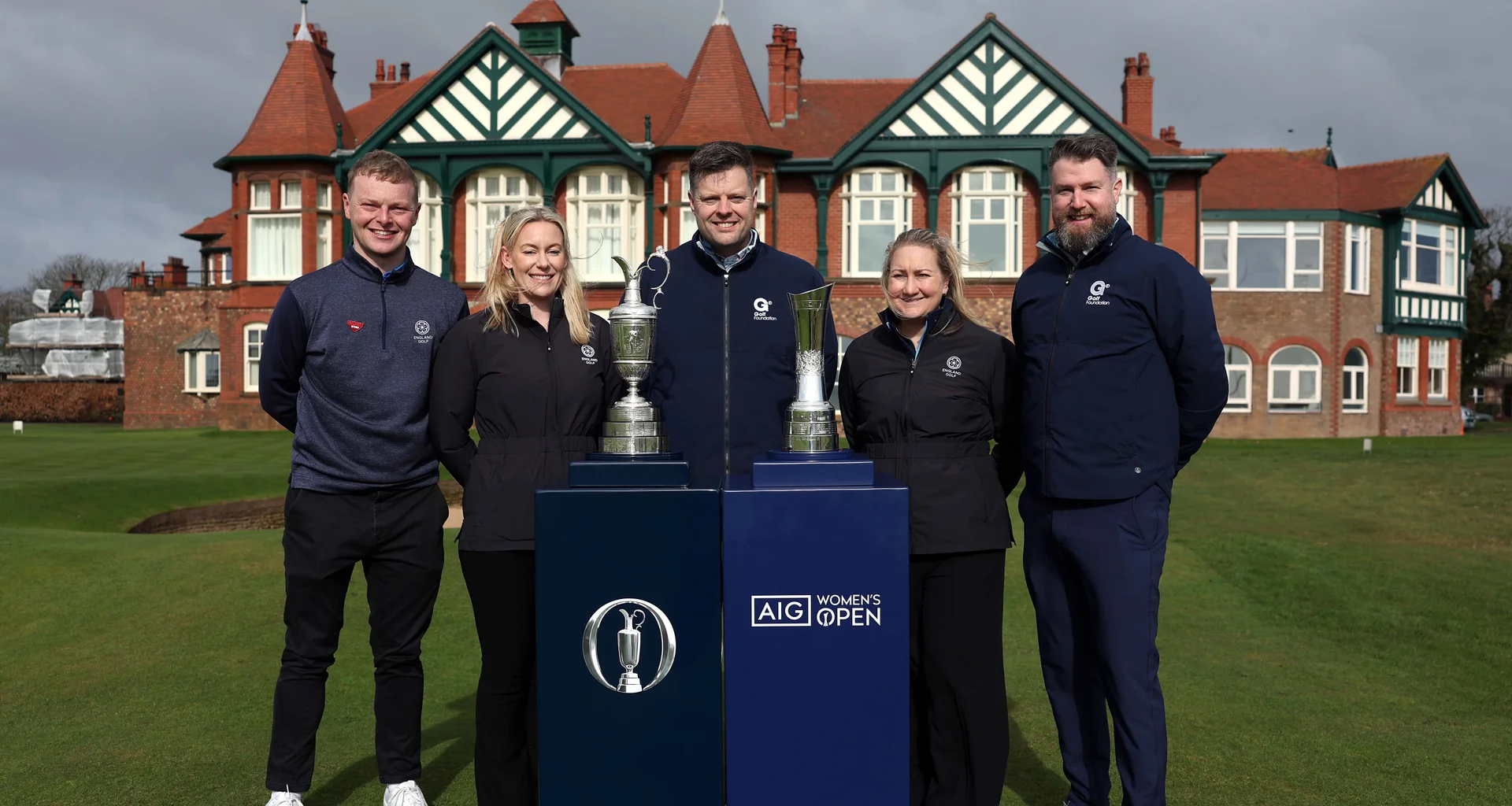 Representatives from England Golf and The Golf Foundation gather with the Claret Jug and AIG Women's Open trophy at the Road To The Opens launch.