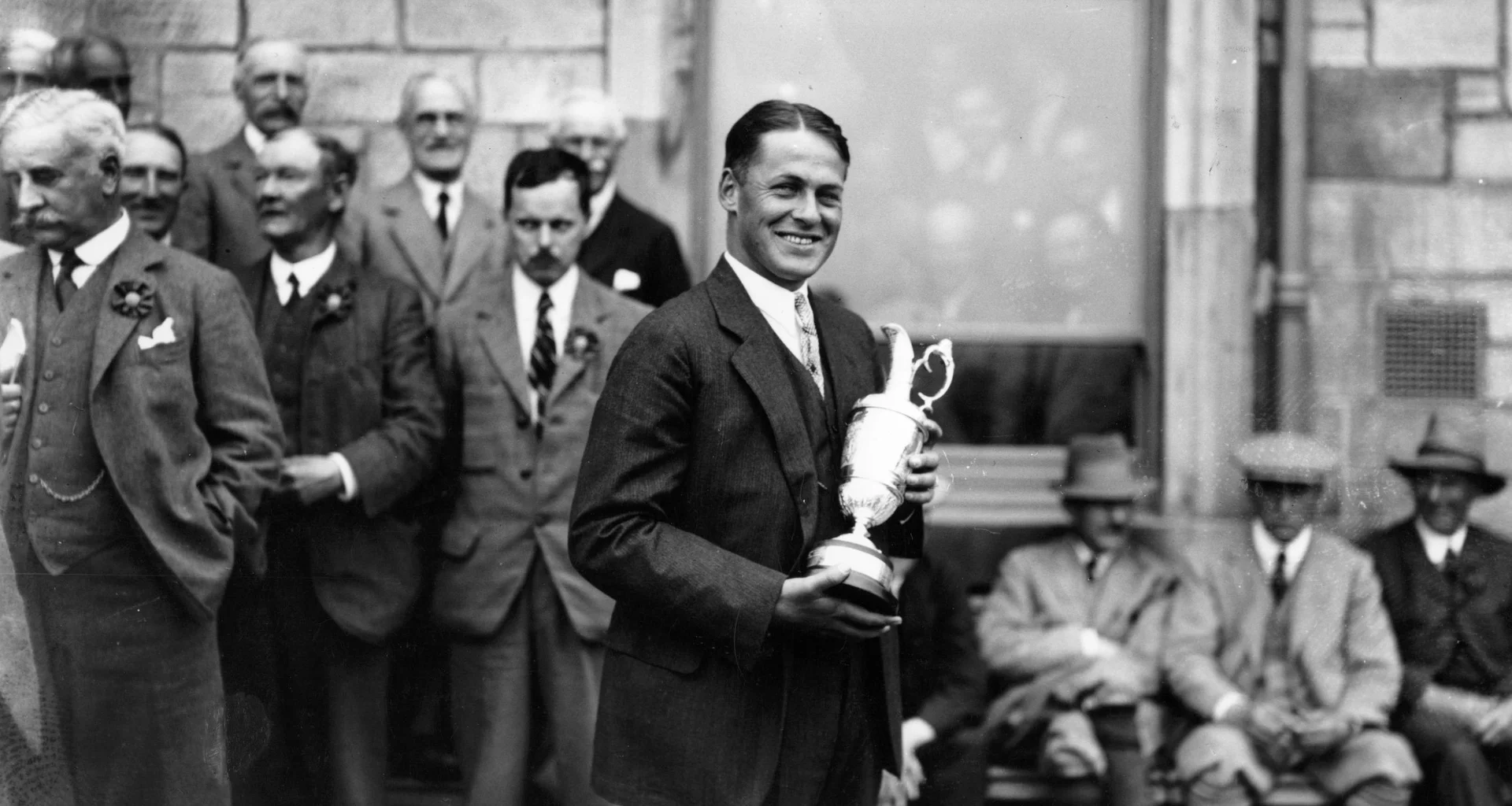 Bobby Jones celebrates with the Claret Jug after winning The Open at St Andrews.
