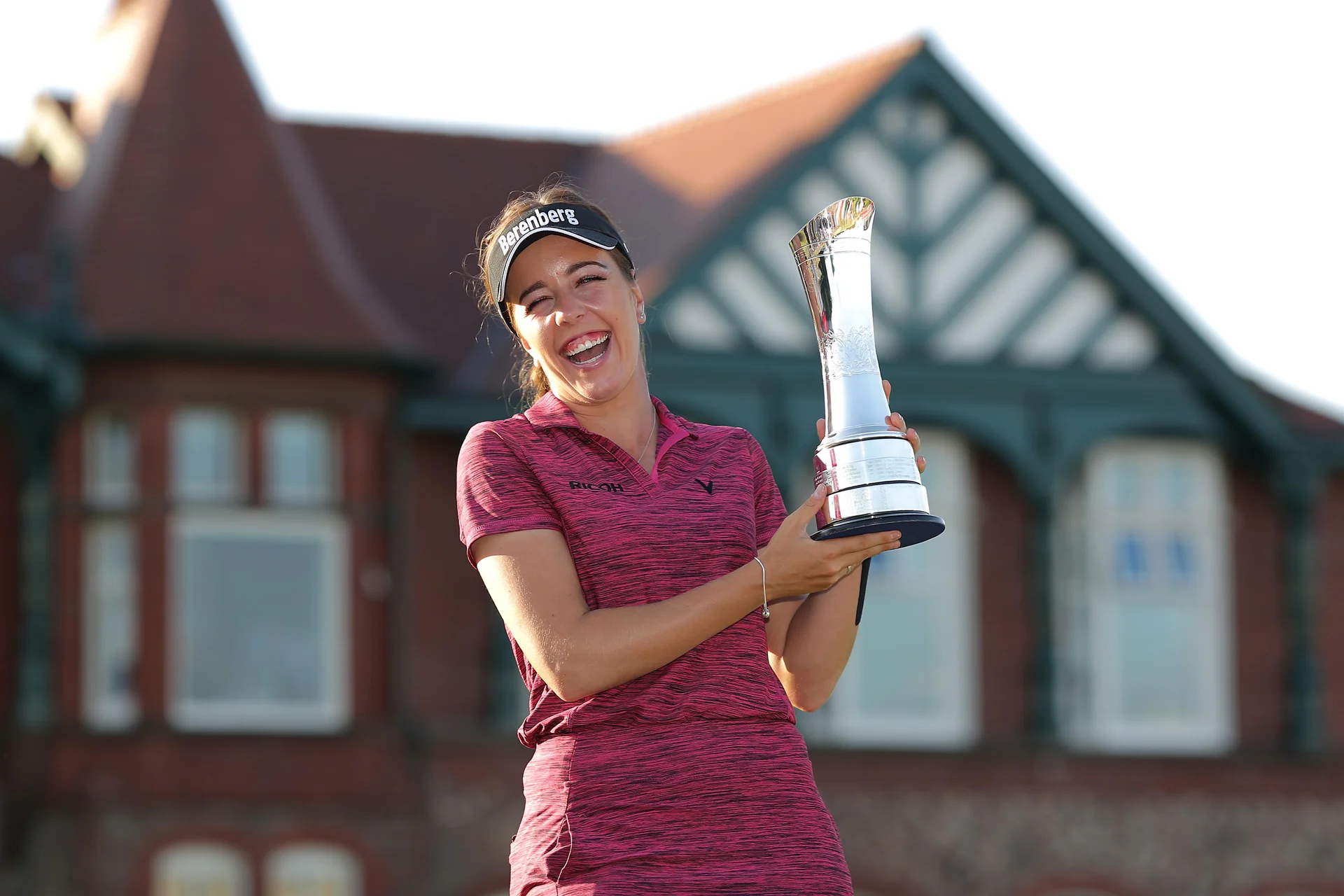 Georgia Hall of England holds the trophy after her victory in the final round of the Women's Open at Royal Lytham & St Annes Golf Club.