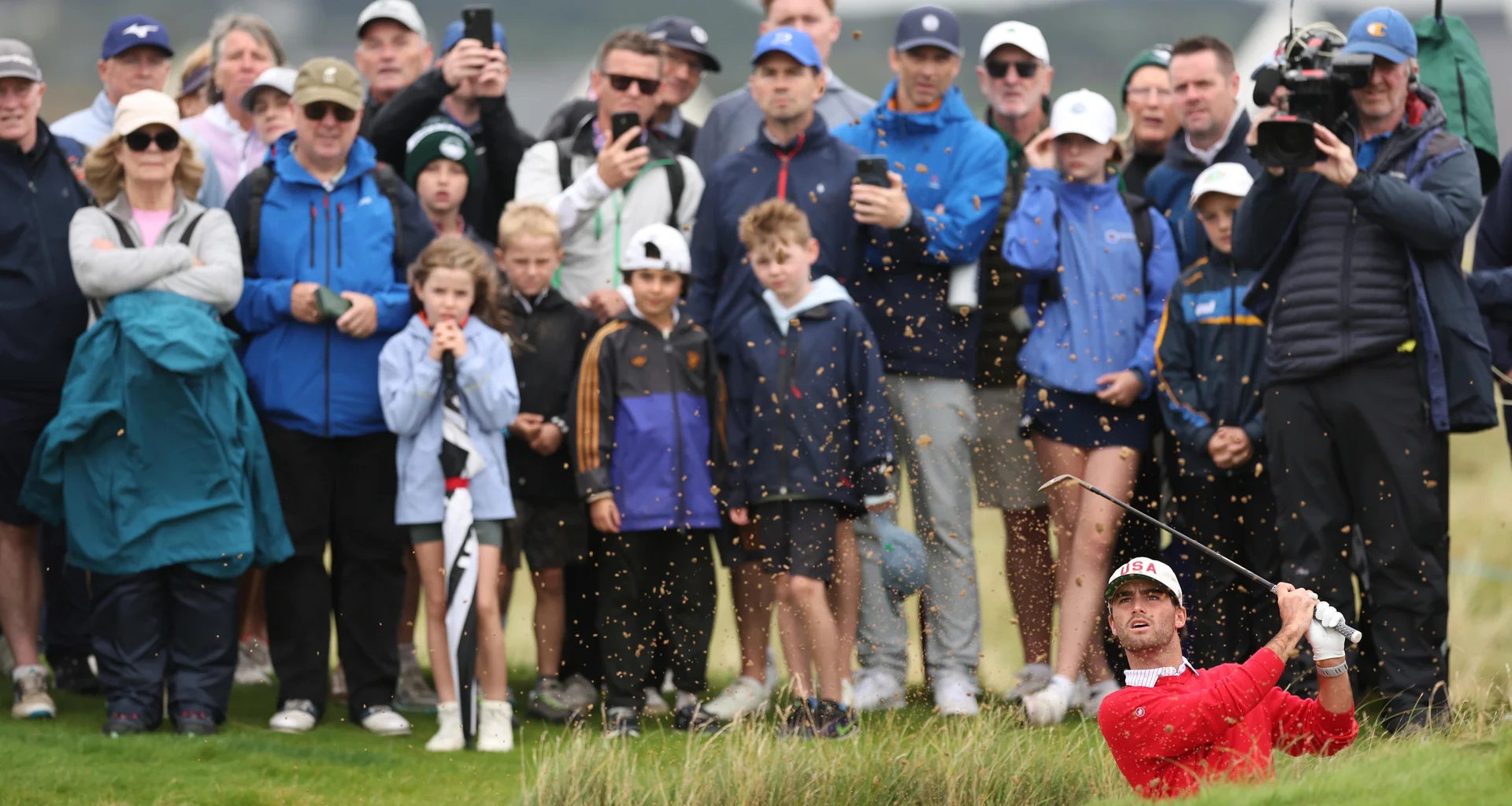 Ryder Cowan of the United States hits a bunker shot during the Sunday Foursomes on Day Two of the Walker Cup at Lahinch.