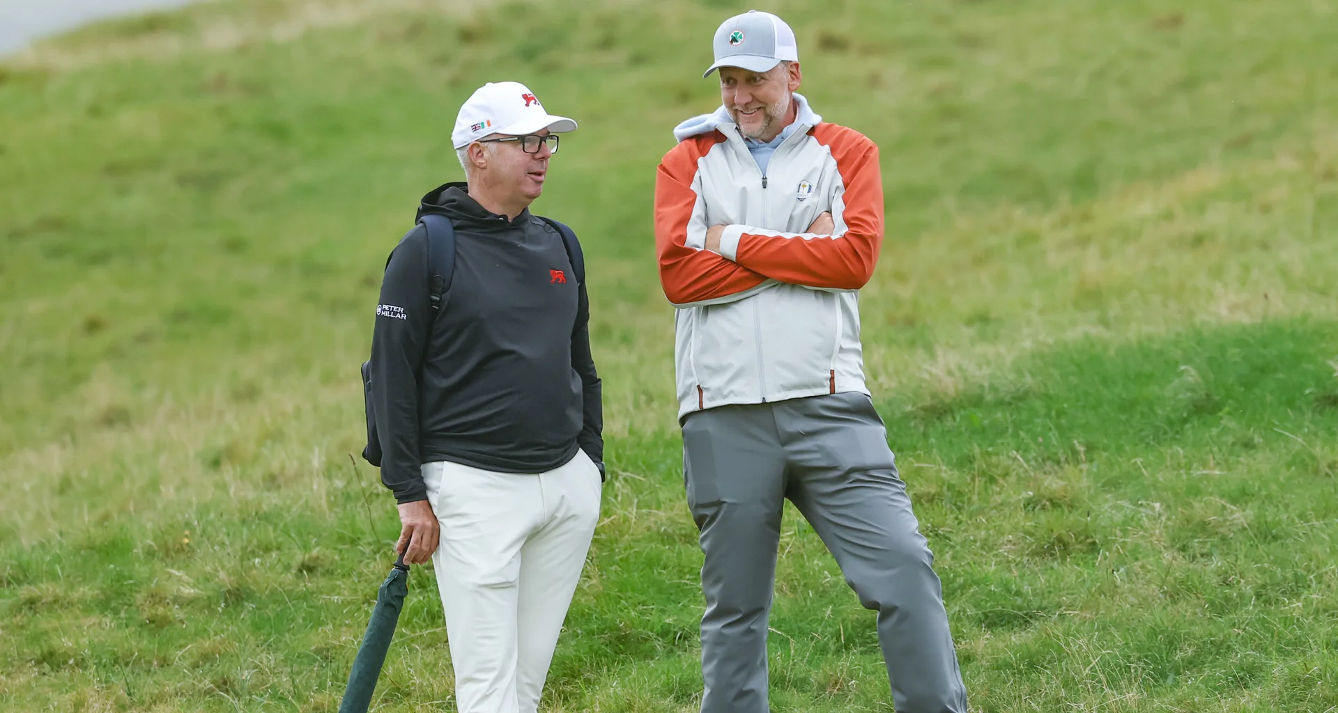 Ian Poulter speaks to captain Dean Robertson ahead of the 2026 Walker Cup at Lahinch.