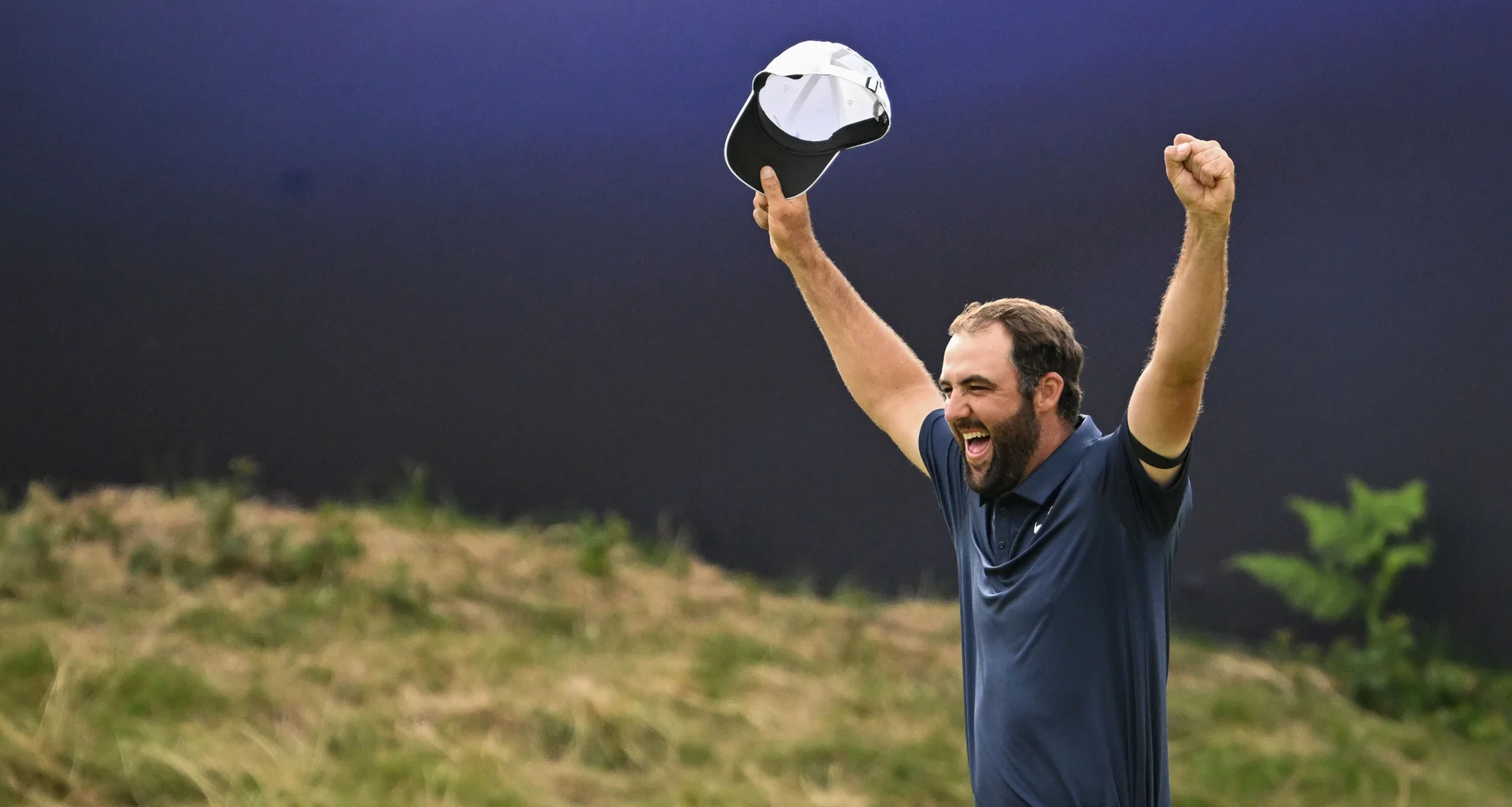 Scottie Scheffler celebrates victory at The 153rd Open at Royal Portrush.