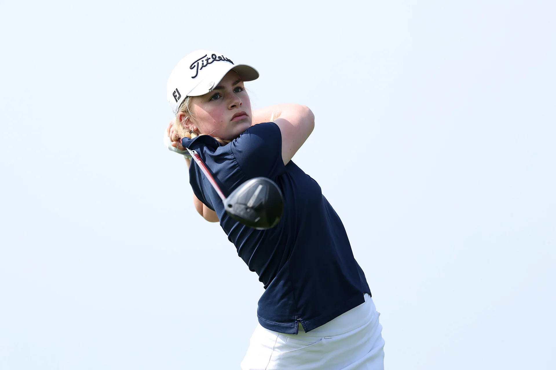 Carly McDonald of St Regulus tees off on the second hole during Day Three of the R&A Girls U16 Amateur Championship at Gog Magog Golf Club.