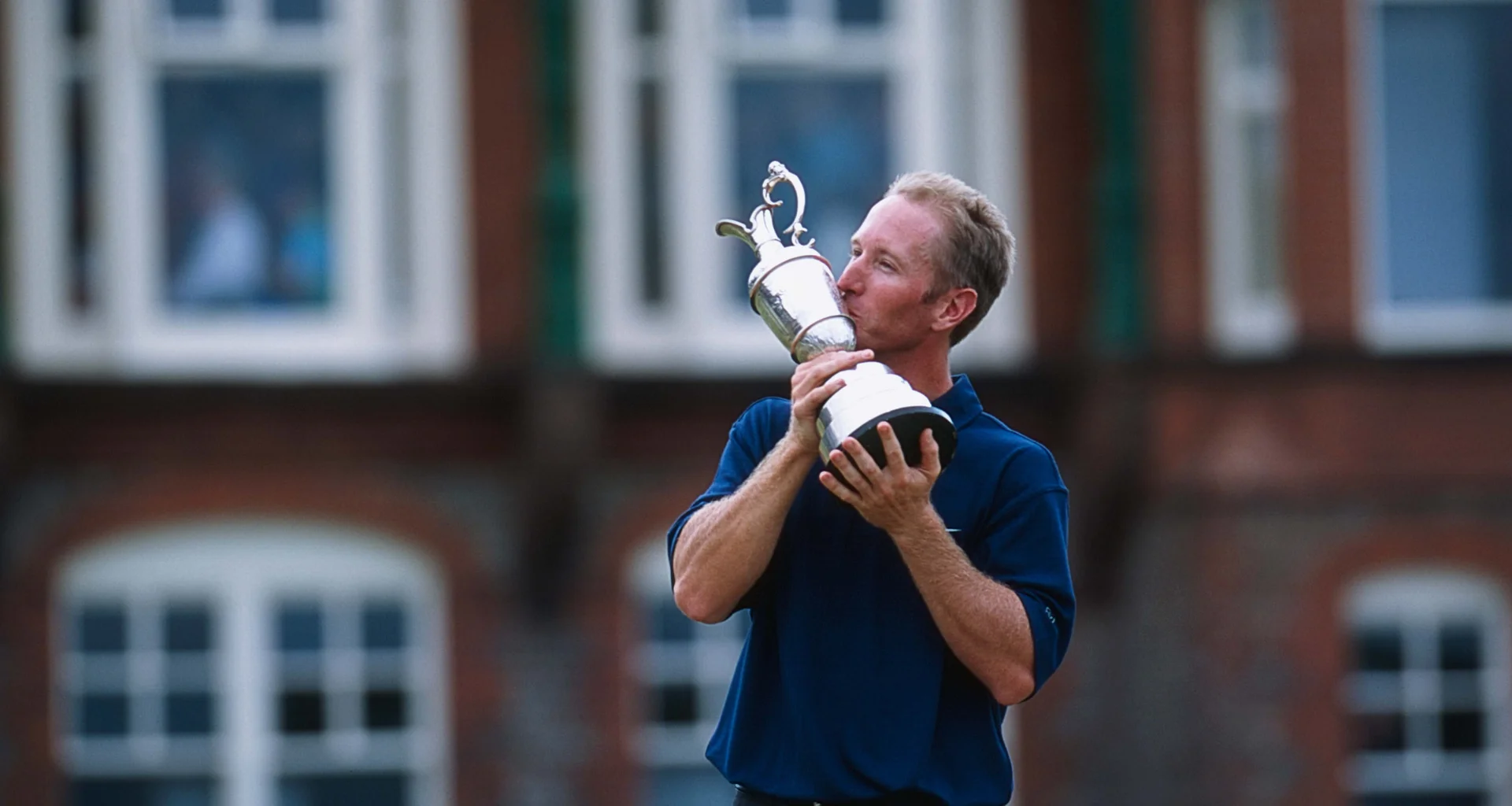 David Duval celebrates with the Claret Jug after winning The Open at Royal Lytham & St Annes.