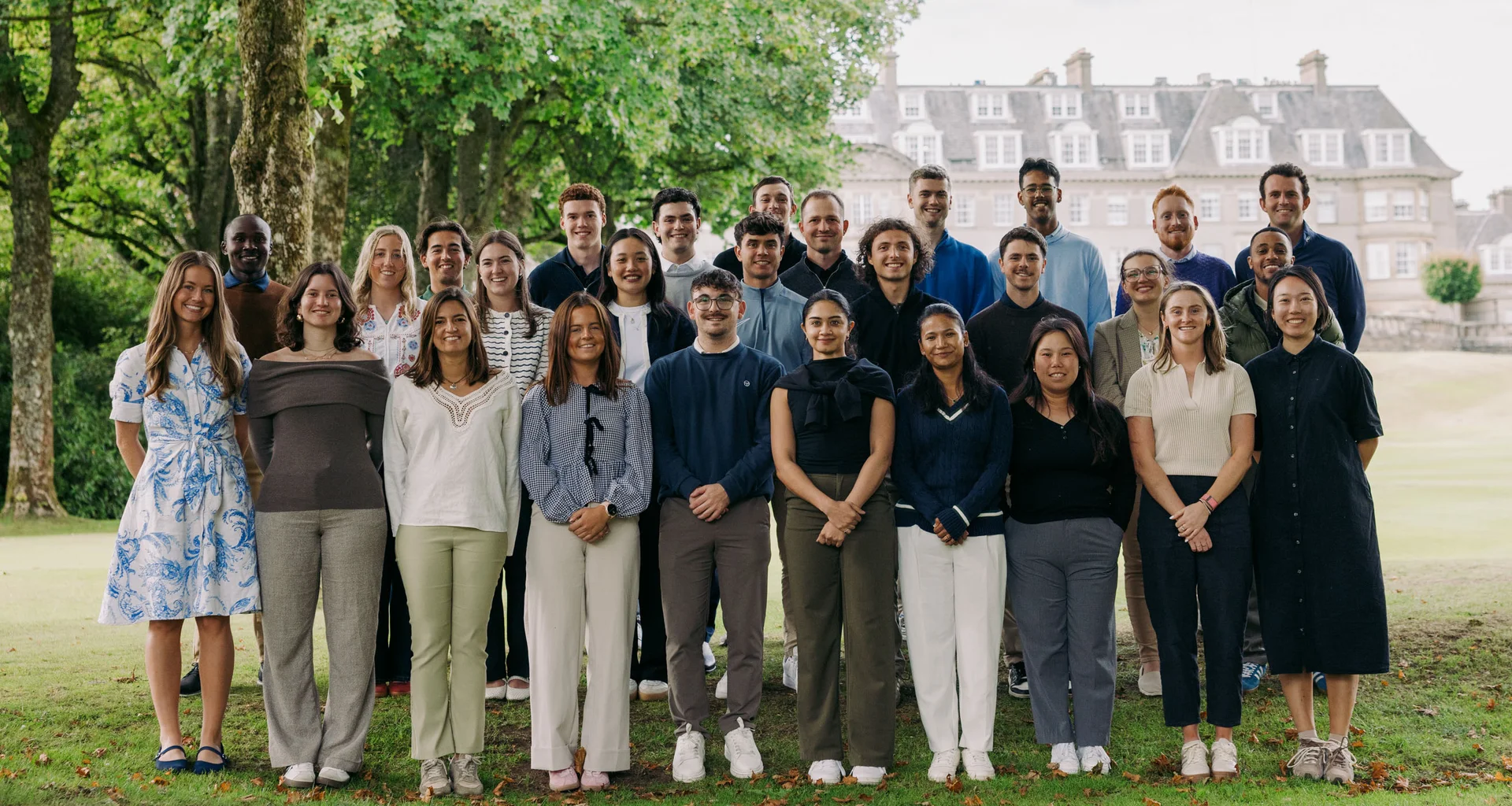 The R&A Scholars stand together for a group photograph.