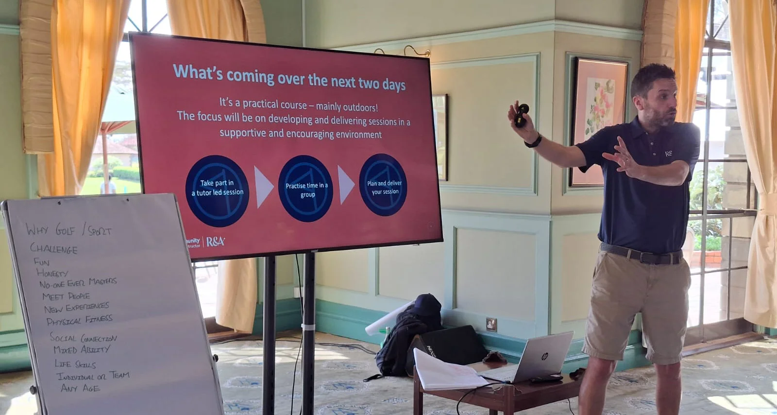 A golf coach from The R&A leads a training session in Africa.