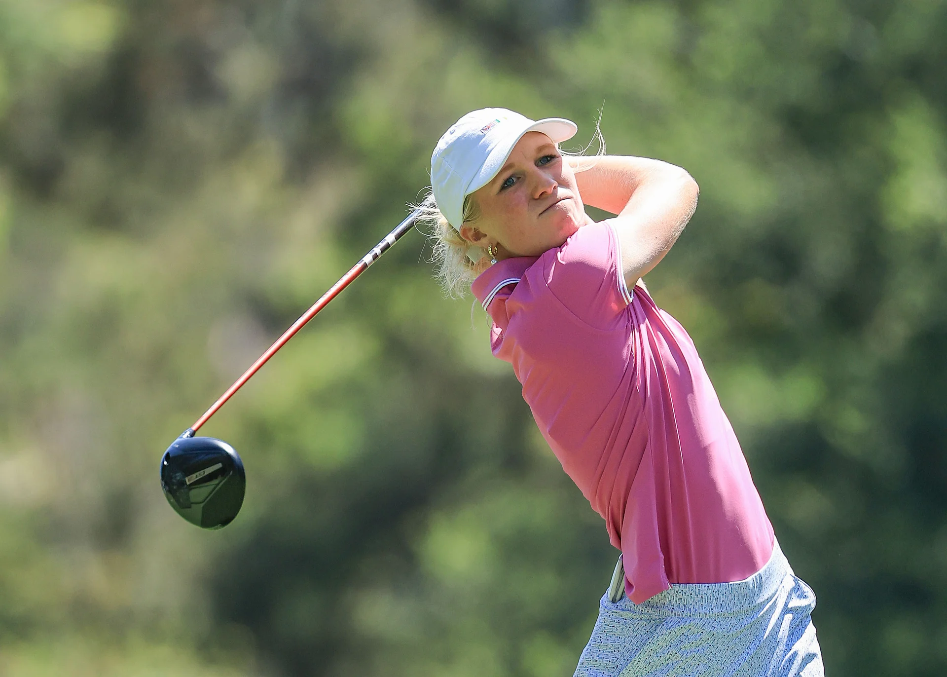 Nellie Ong of England and The Great Britain and Ireland Team plays her tee shot on the second hole during the final day singles matches in the 2026 Curtis Cup match at the Bel-Air Country Club.