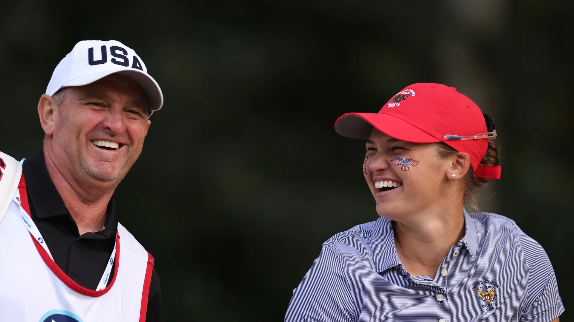Melanie Green of USA reacts with her caddie during the Sunday Singles on Match Day Three of the Curtis Cup at Sunningdale Golf Club.