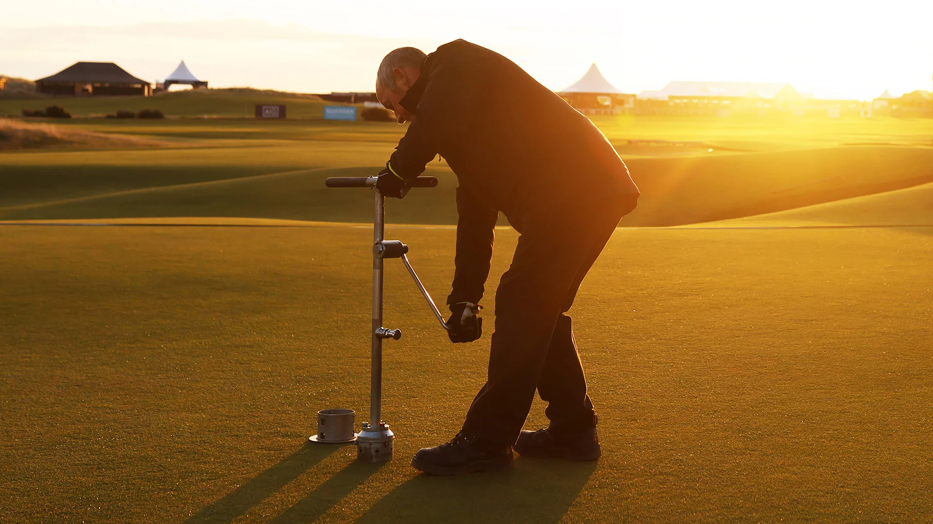 A greenkeeper at the 2024 AIG Women's Open