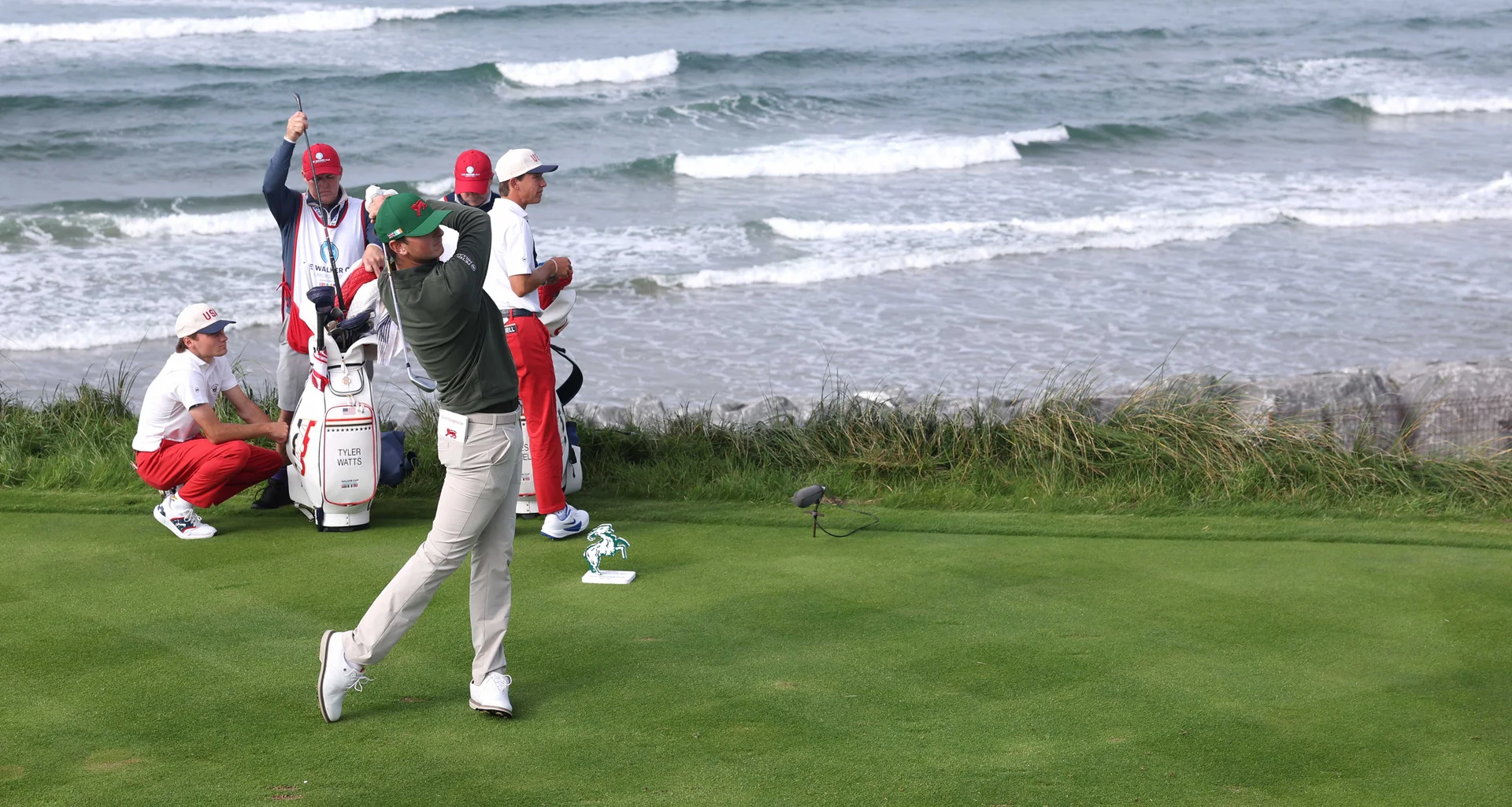 Sam Easterbrook of Great Britain & Ireland tees off on the seventh hole during the morning foursomes matches on day one of the Walker Cup at Lahinch.